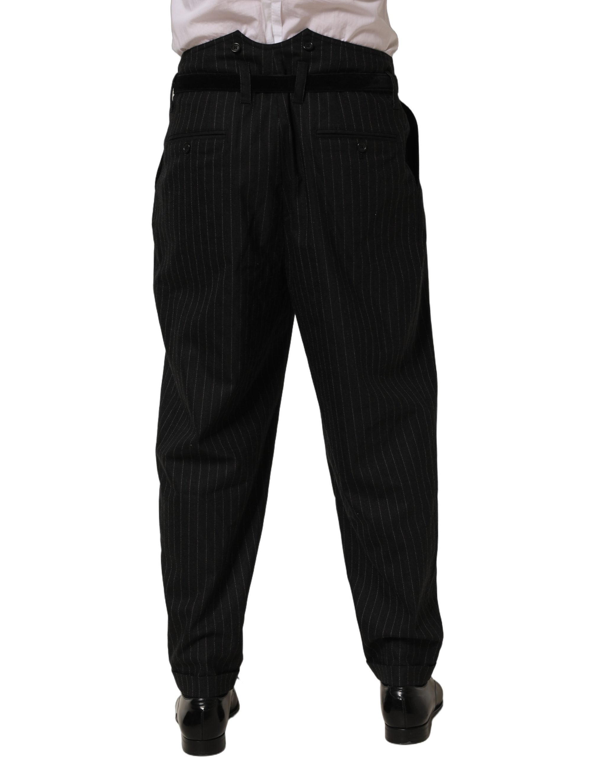 Pantalon homme Dolce & Gabbana en laine noire à rayures fines, style élégant et classique, visible en détail sur l'image.