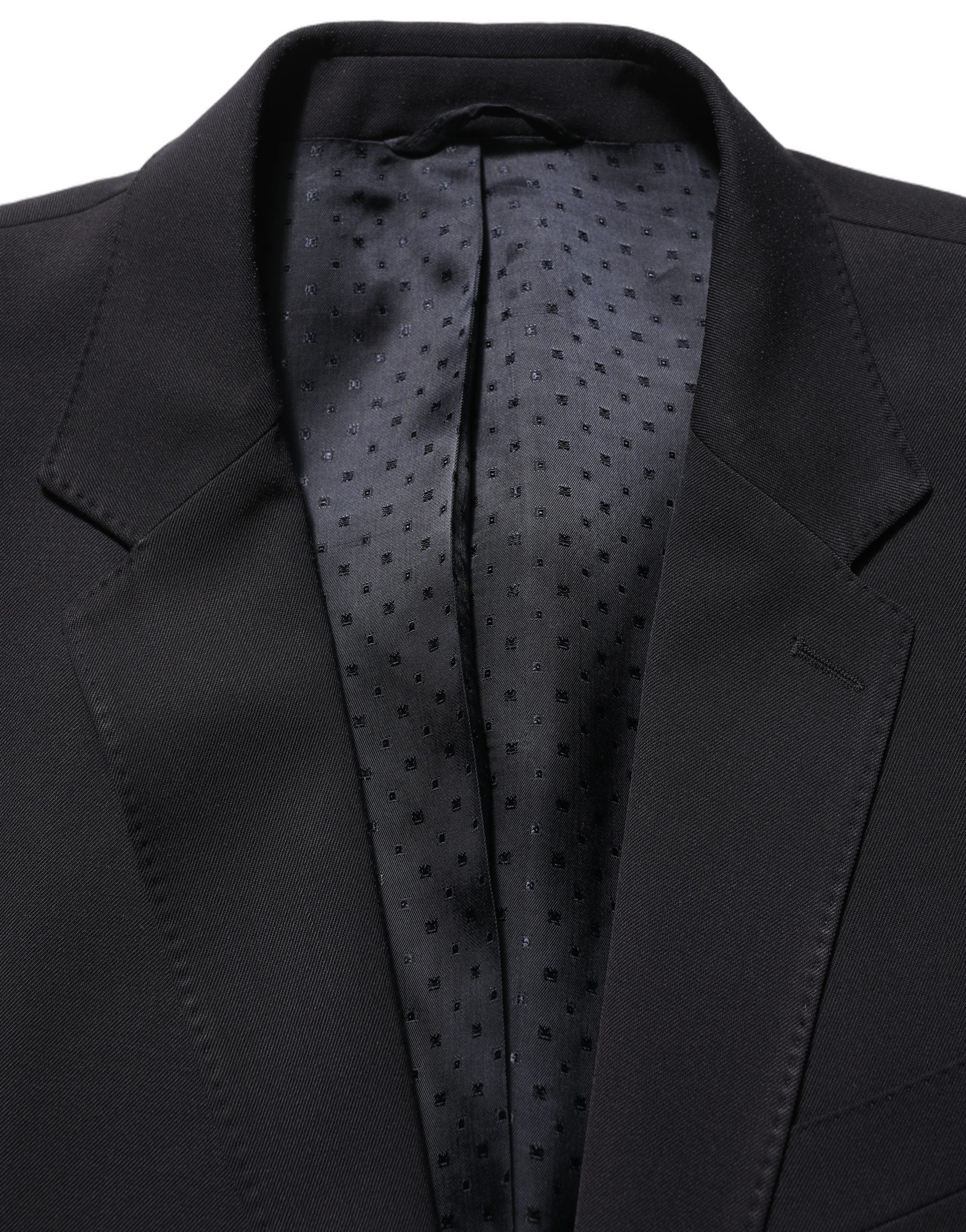 Costume homme noir en laine Dolce & Gabbana, costume deux pièces ajusté et élégant pour occasions formelles.