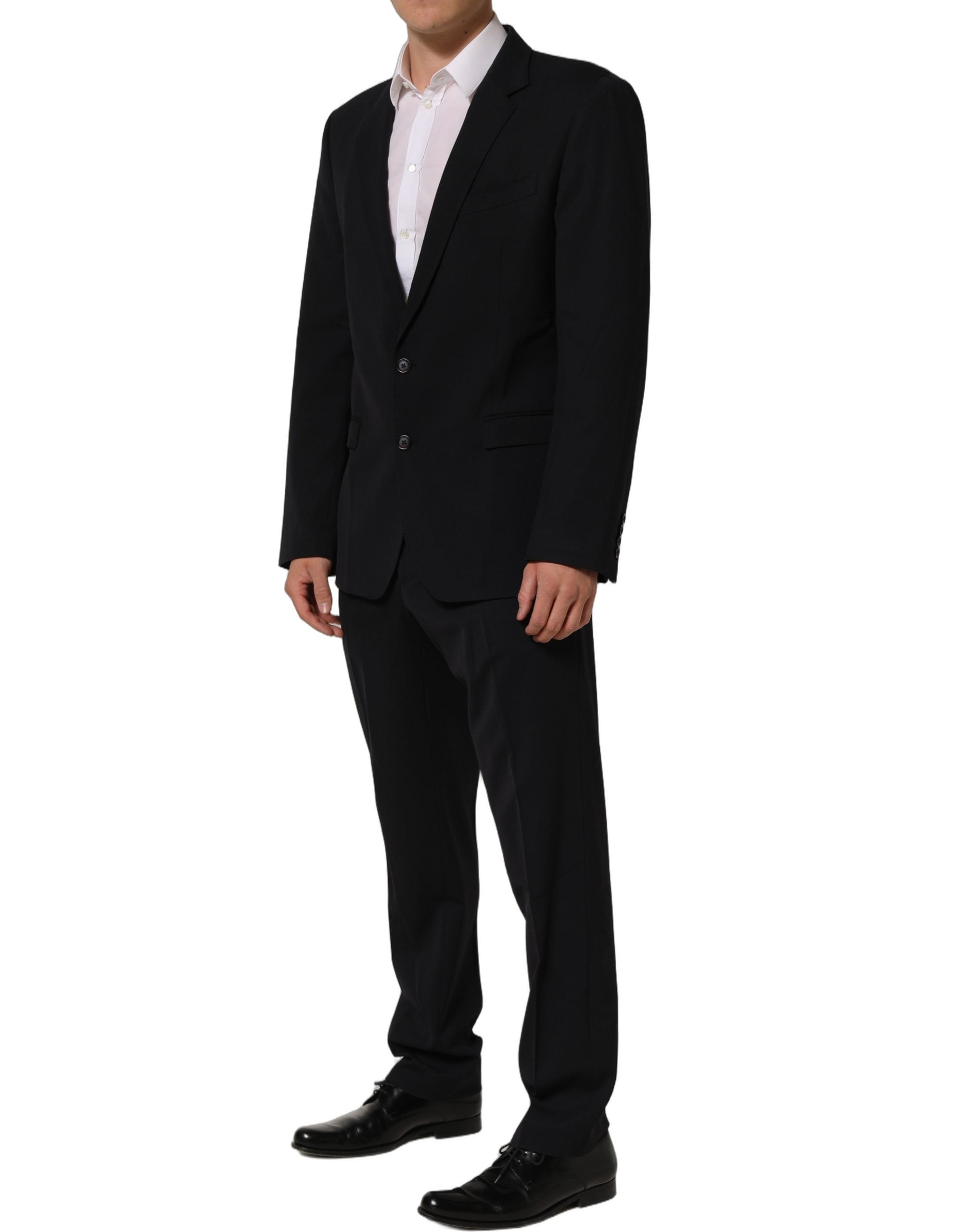 Costume homme formel noir Dolce & Gabbana en laine à coupe slim, élégante tenue deux pièces pour occasions spéciales.