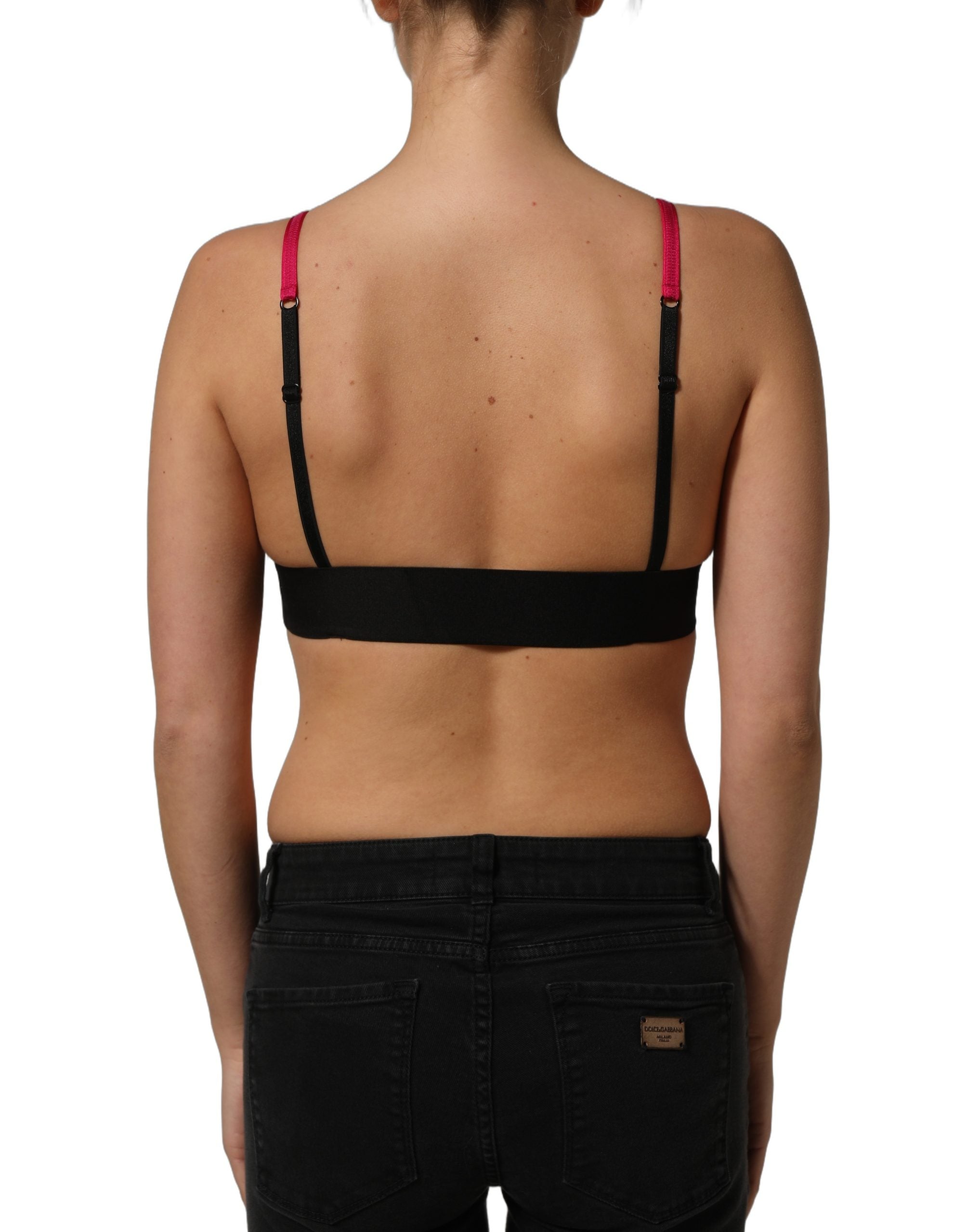 Brassière courte Dolce & Gabbana rose ornée de cristaux brillants, style élégant et sophistiqué, vue de face.