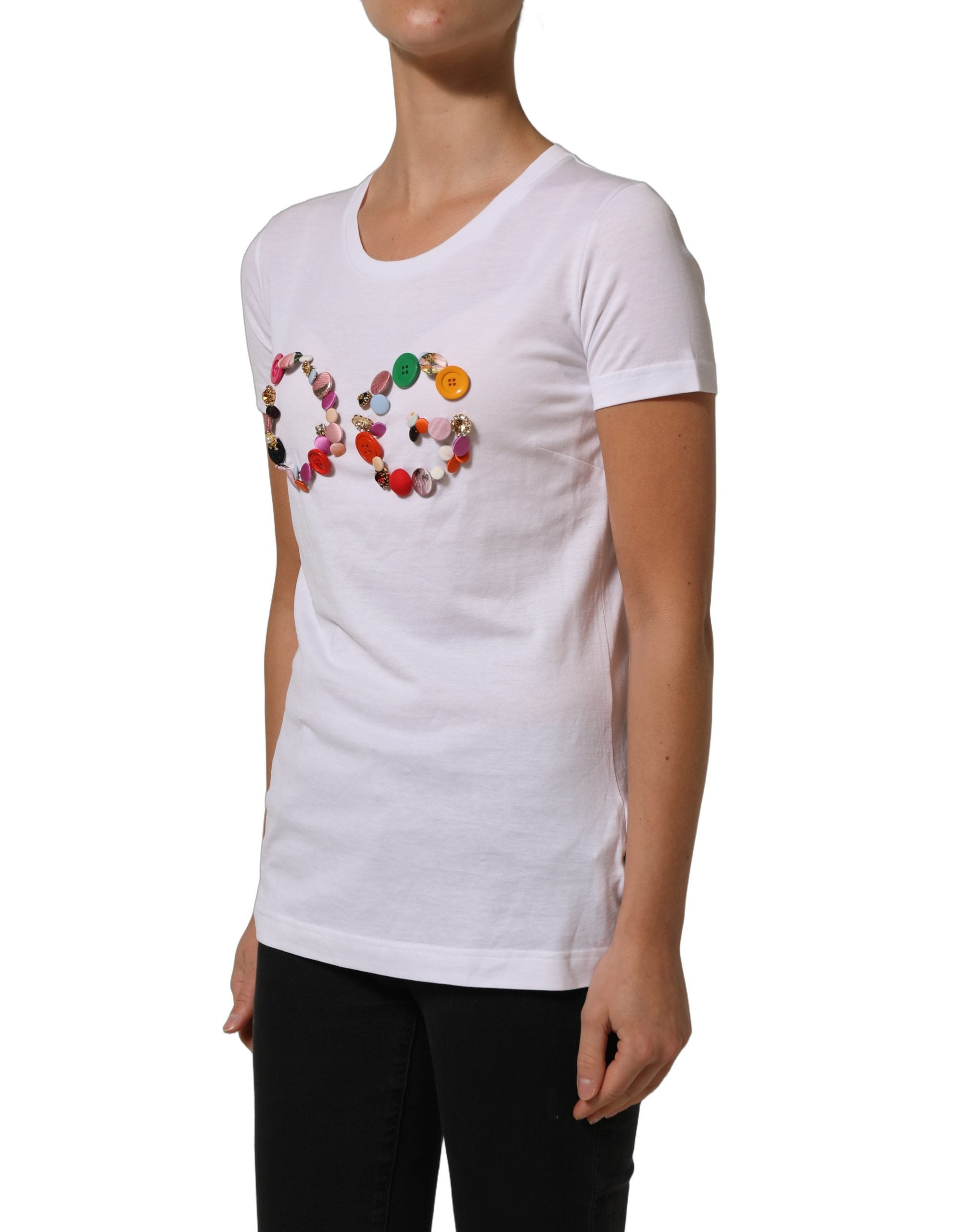 T-shirt blanche Dolce & Gabbana avec logo DG orné d'un col rond et embellissements visibles sur l'image.
