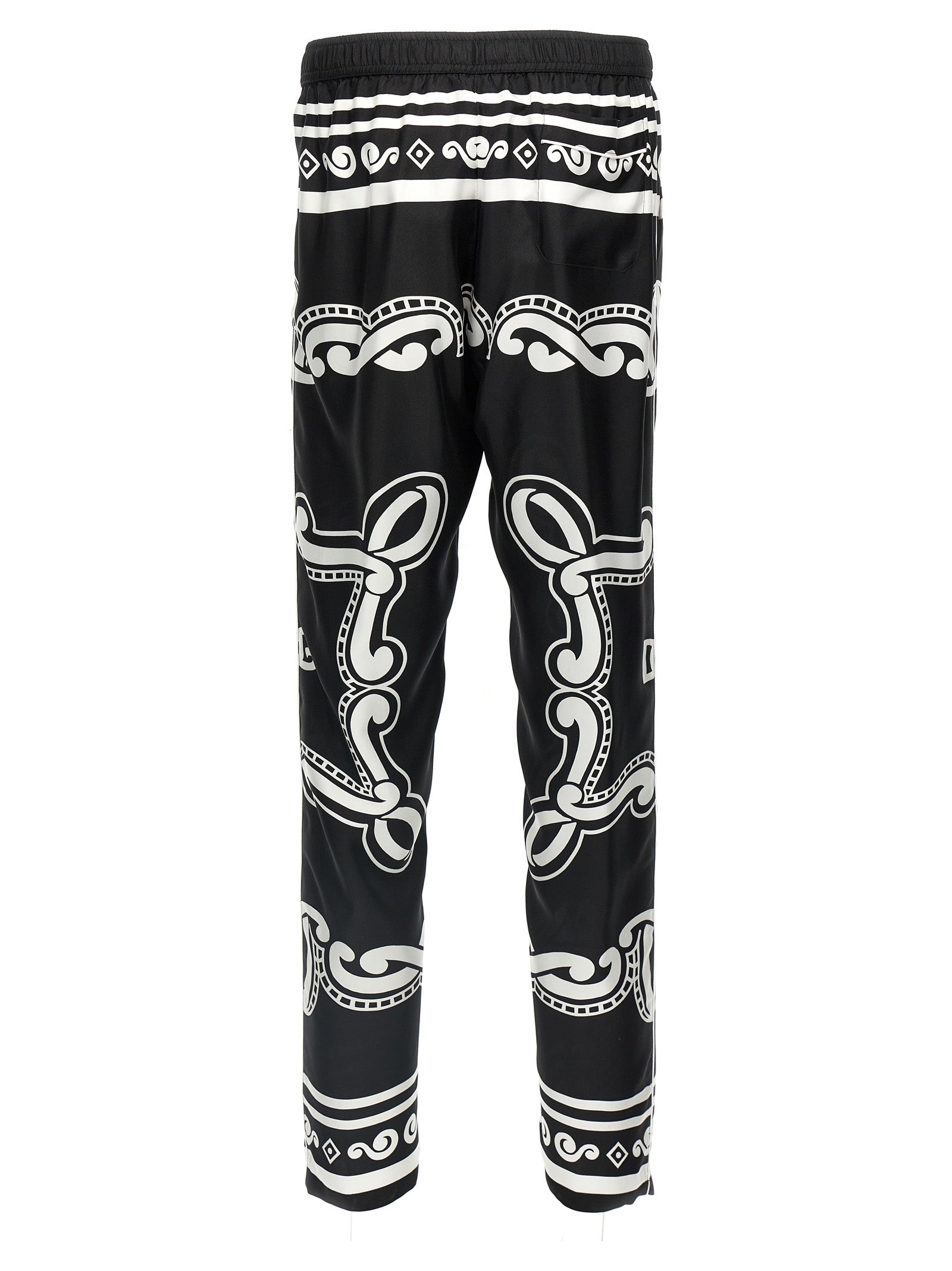 Pantalons décontractés en soie bicolore de Dolce & Gabbana, style élégant et confortable, vue de face.