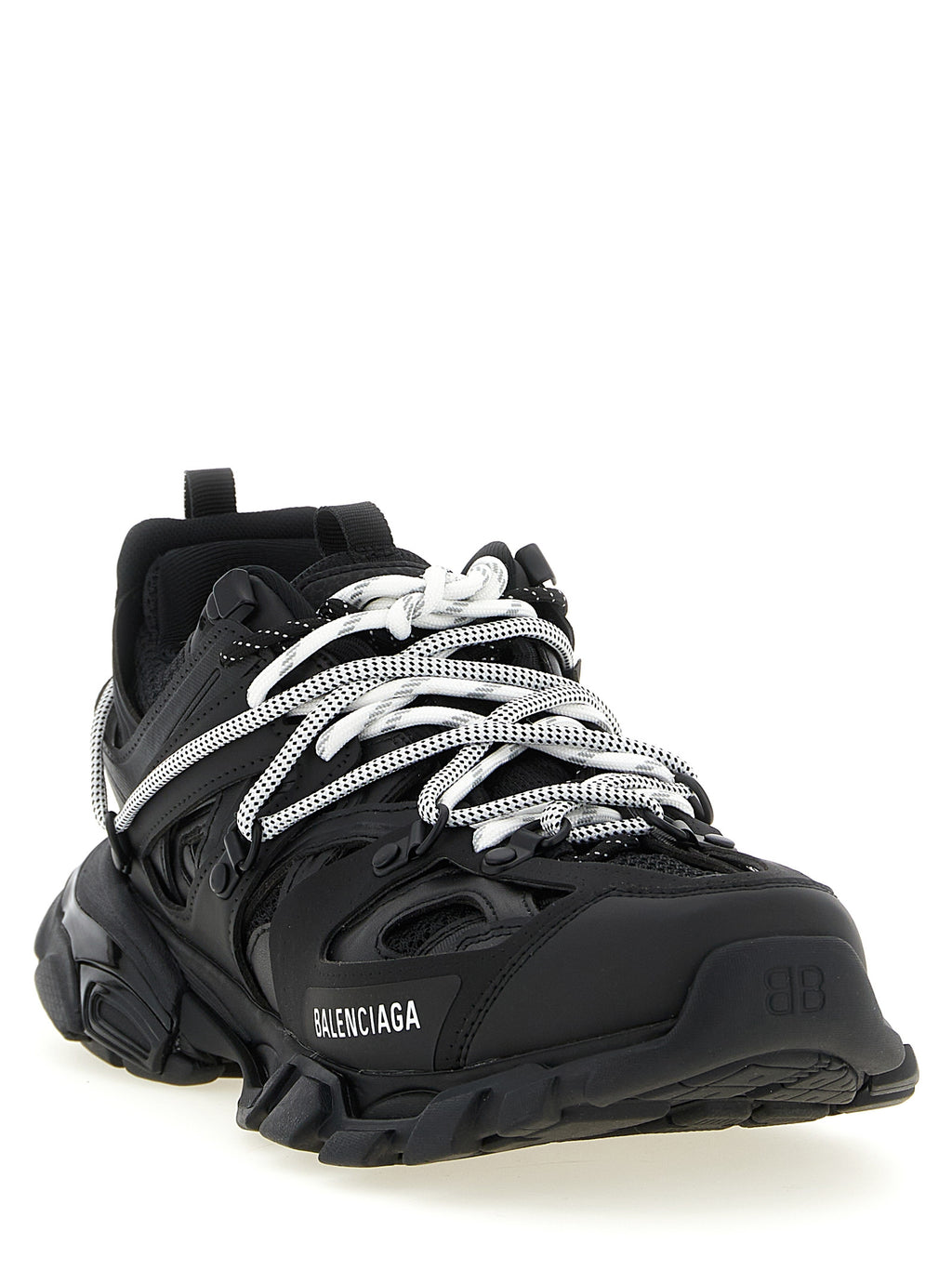 Baskets athlétiques Balenciaga en polyéthylène noir avec semelle blanche, vue de côté.
