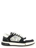 Chaussures basses Amiri en cuir bicolore pour homme, sneakers en daim et cuir avec semelle blanche.