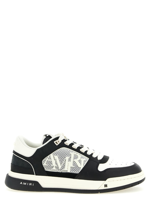 Chaussures basses Amiri en cuir bicolore pour homme, sneakers en daim et cuir avec semelle blanche.