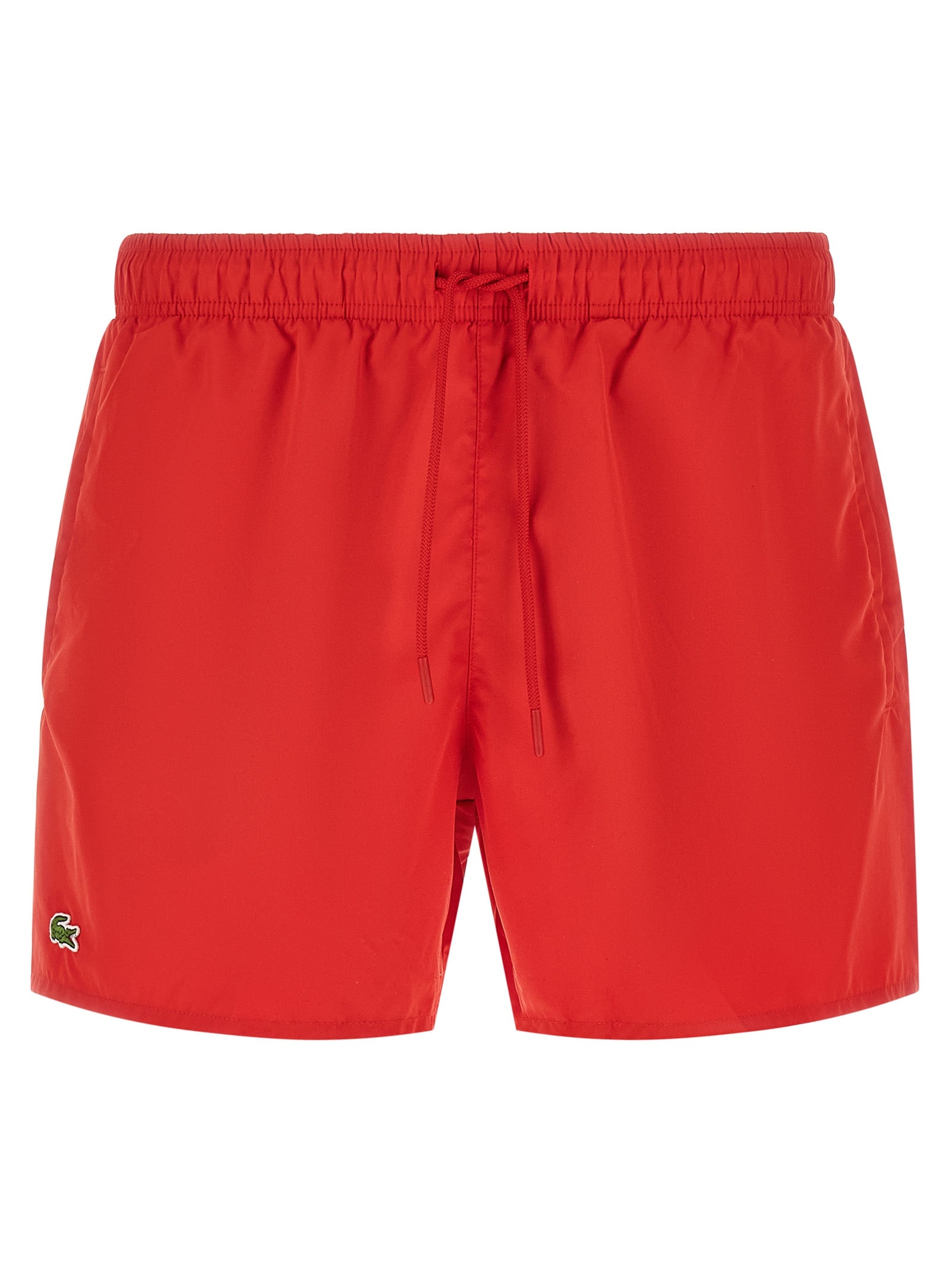 Shorts en polyester multicolores Lacoste, style décontracté, logo Lacoste visible sur la poche, parfait pour l'été.