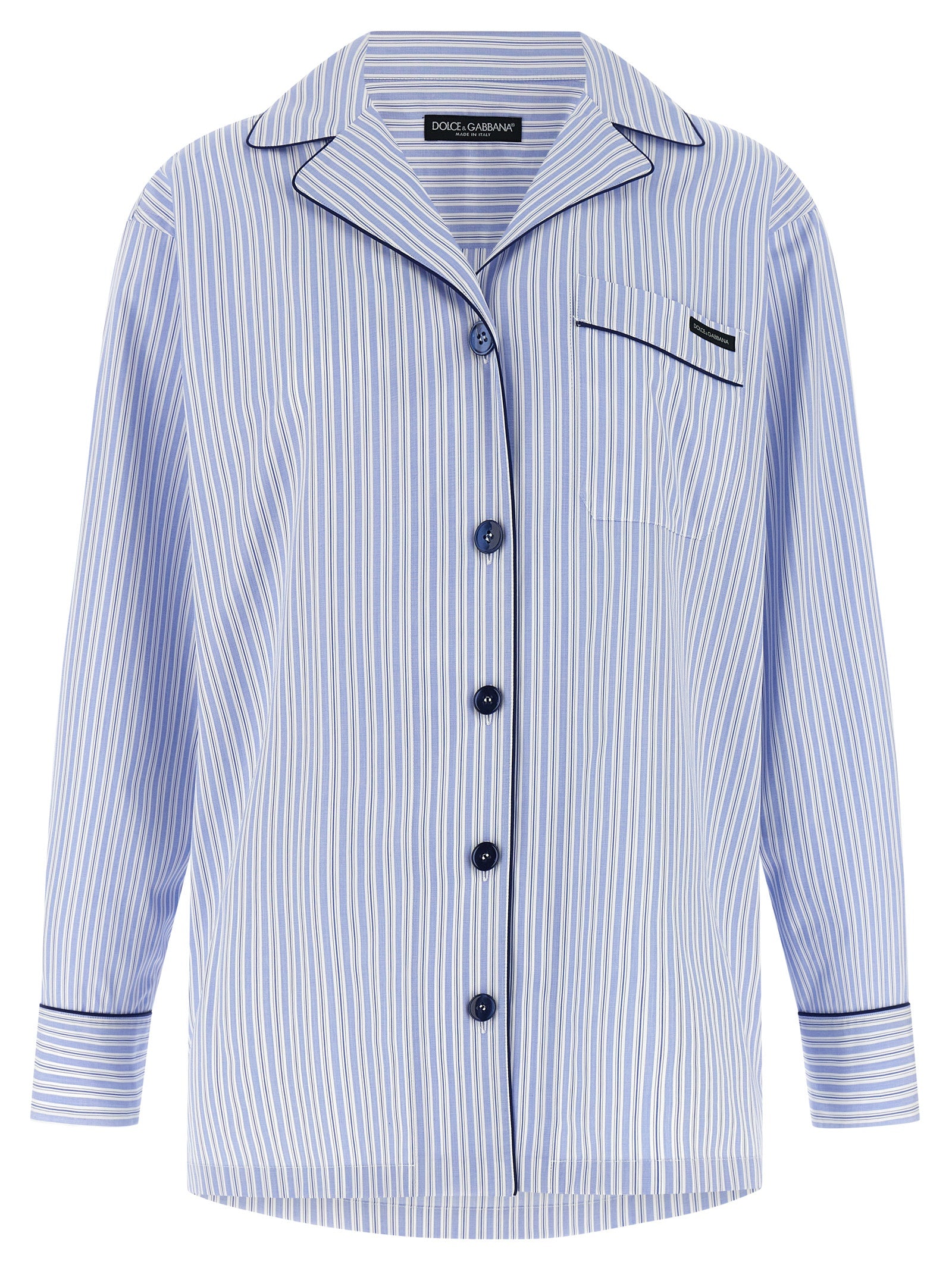 Blouse en coton bleu de Dolce & Gabbana avec manches longues et détails élégants, portée en style décontracté.