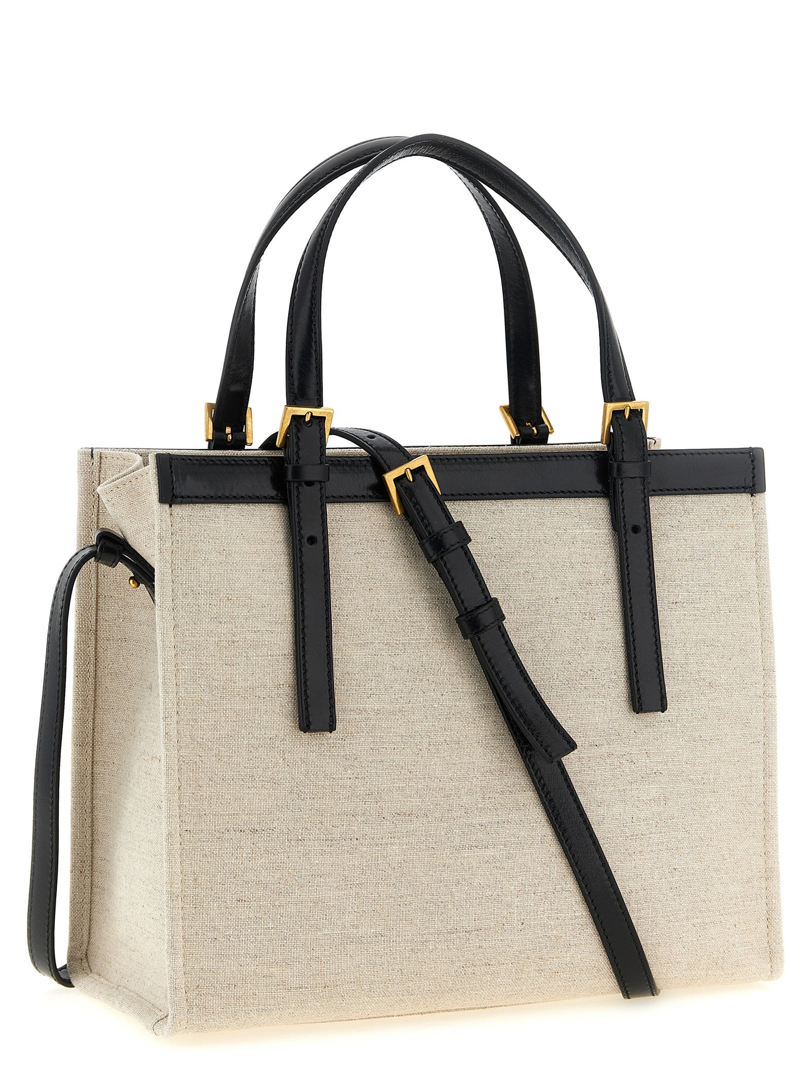 Sac tote en cuir beige de Versace, élégant et spacieux, avec logo emblématique visible sur le devant.
