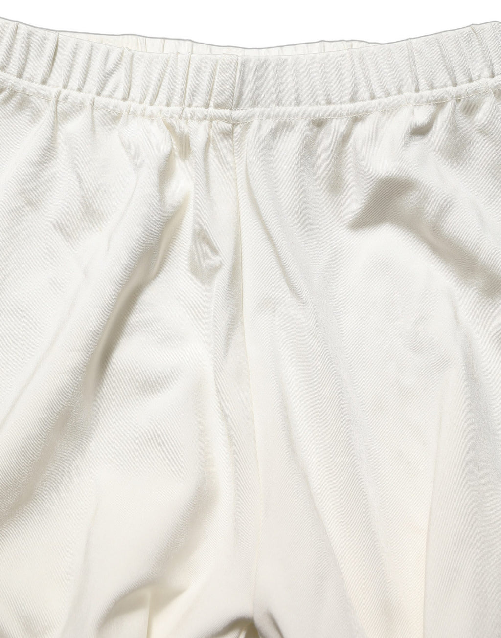 Chaussures à talons hauts blanches Dolce & Gabbana, pumps en jersey avec collants assortis, élégantes et sophistiquées.