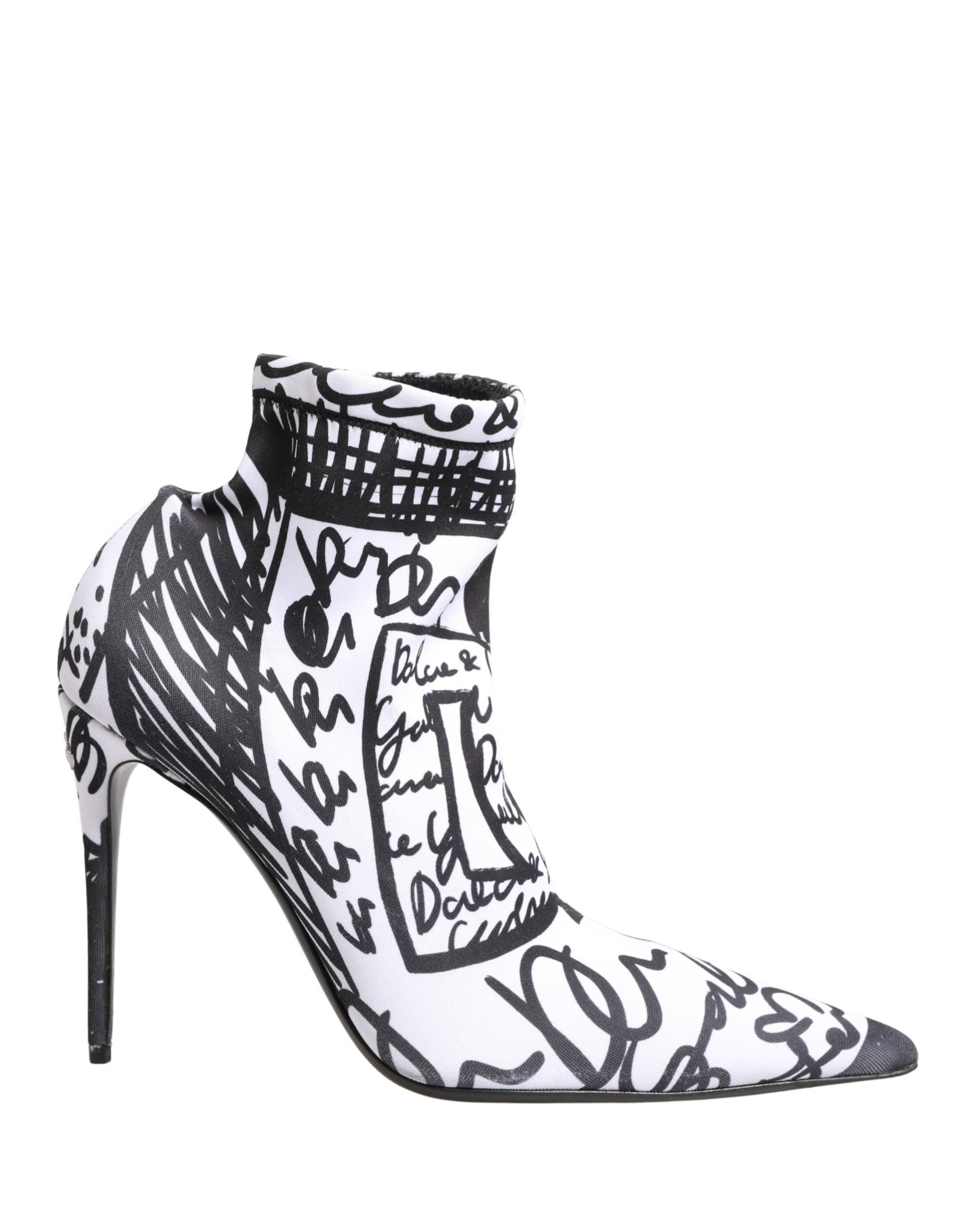 Chaussures bottines blanches Dolce & Gabbana Graffiti extensibles, style moderne avec motif artistique visible sur la photo.