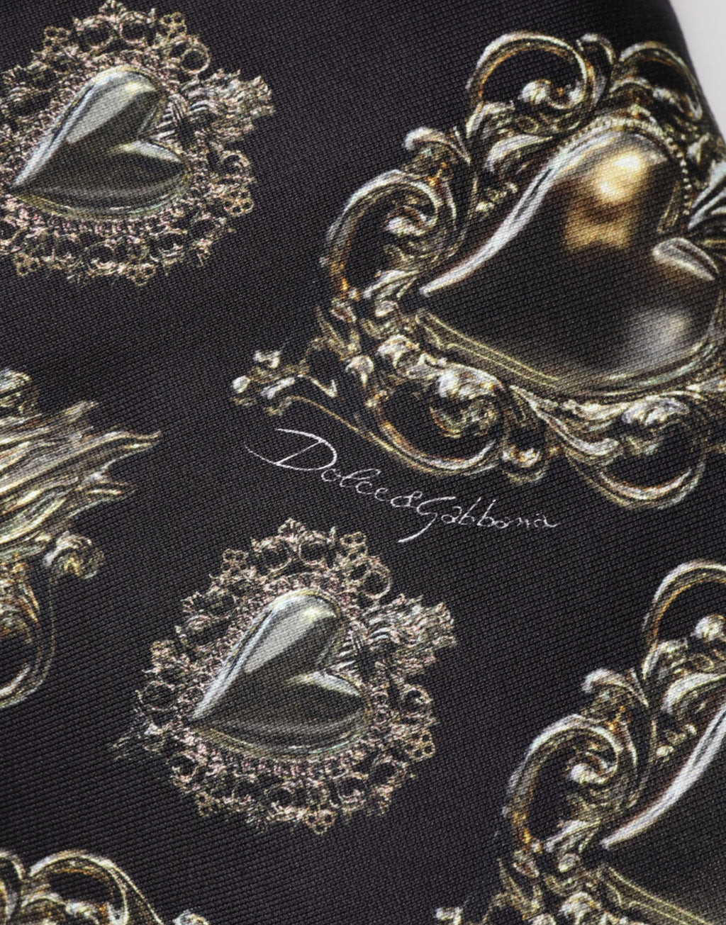 Sweat-shirt en coton noir Dolce & Gabbana avec motif cœur sacré, manches longues et design élégant.