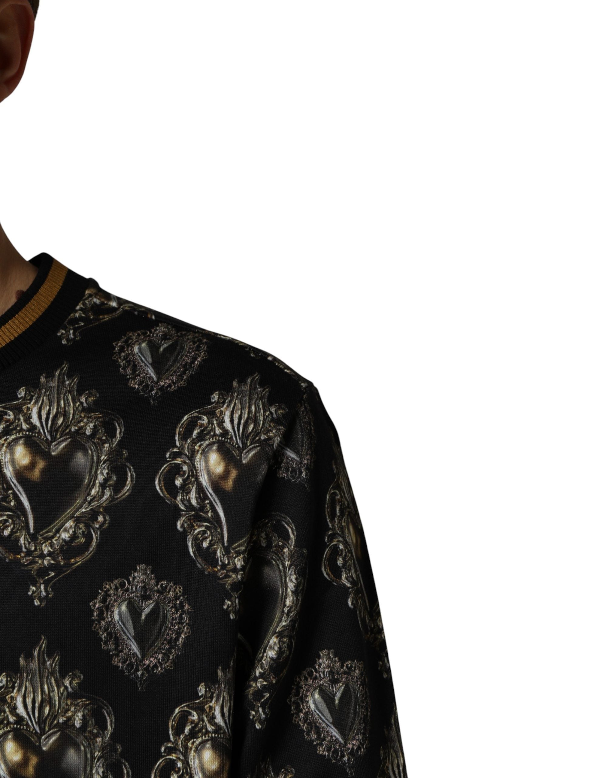 Sweatshirt en coton noir Dolce & Gabbana avec motif cœur sacré, manches longues et design élégant.