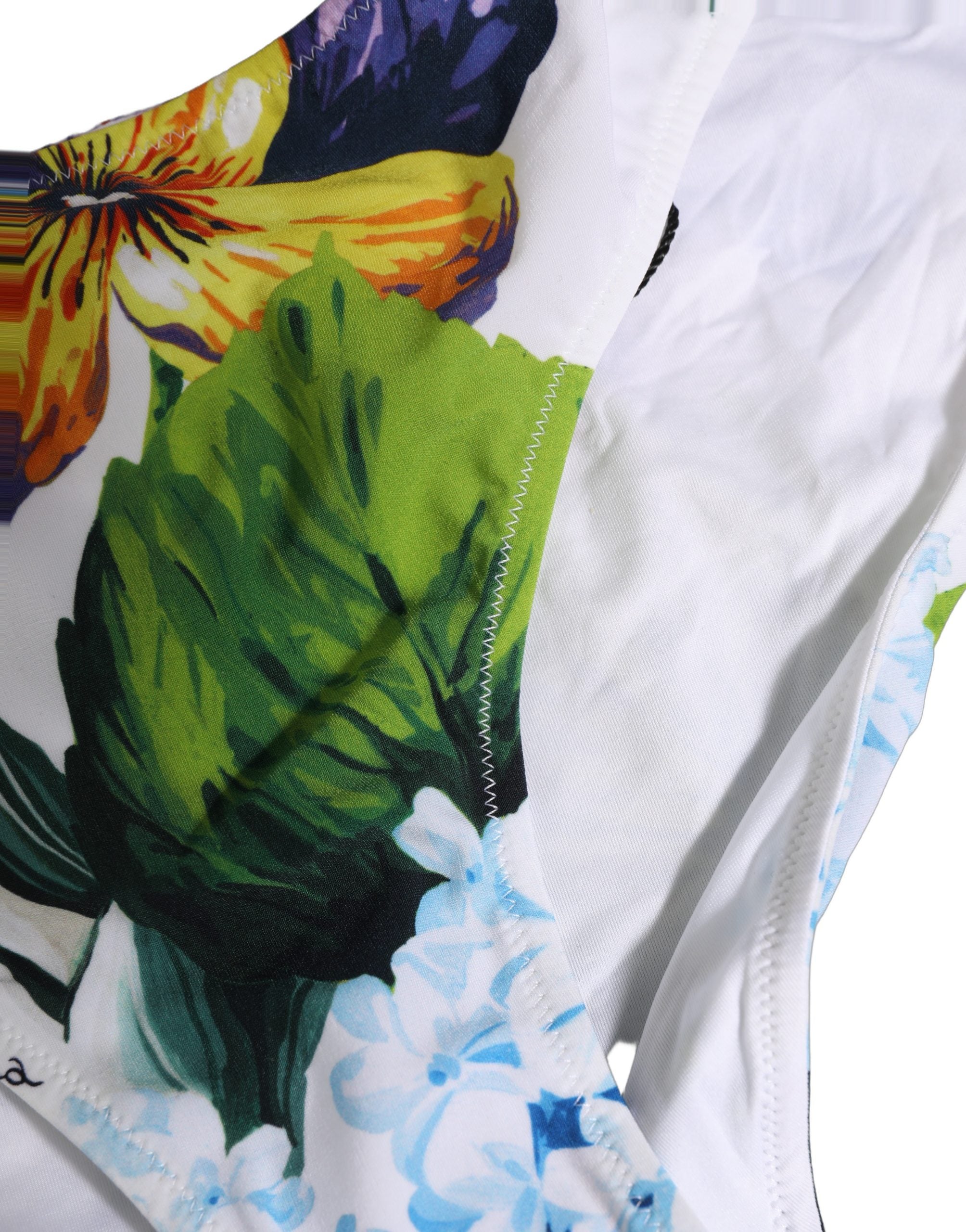 Maillot de bain deux pièces Dolce & Gabbana, tanga floral blanc, haut bandeau élégant pour la plage.