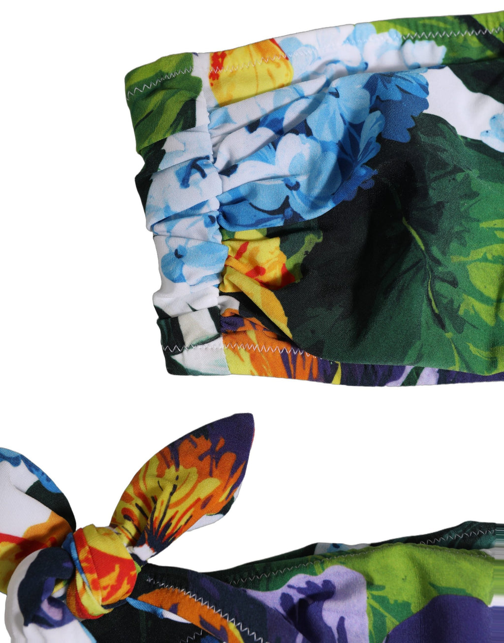 Maillot de bain deux pièces Dolce & Gabbana avec haut bandeau blanc à fleurs, style élégant et féminin.