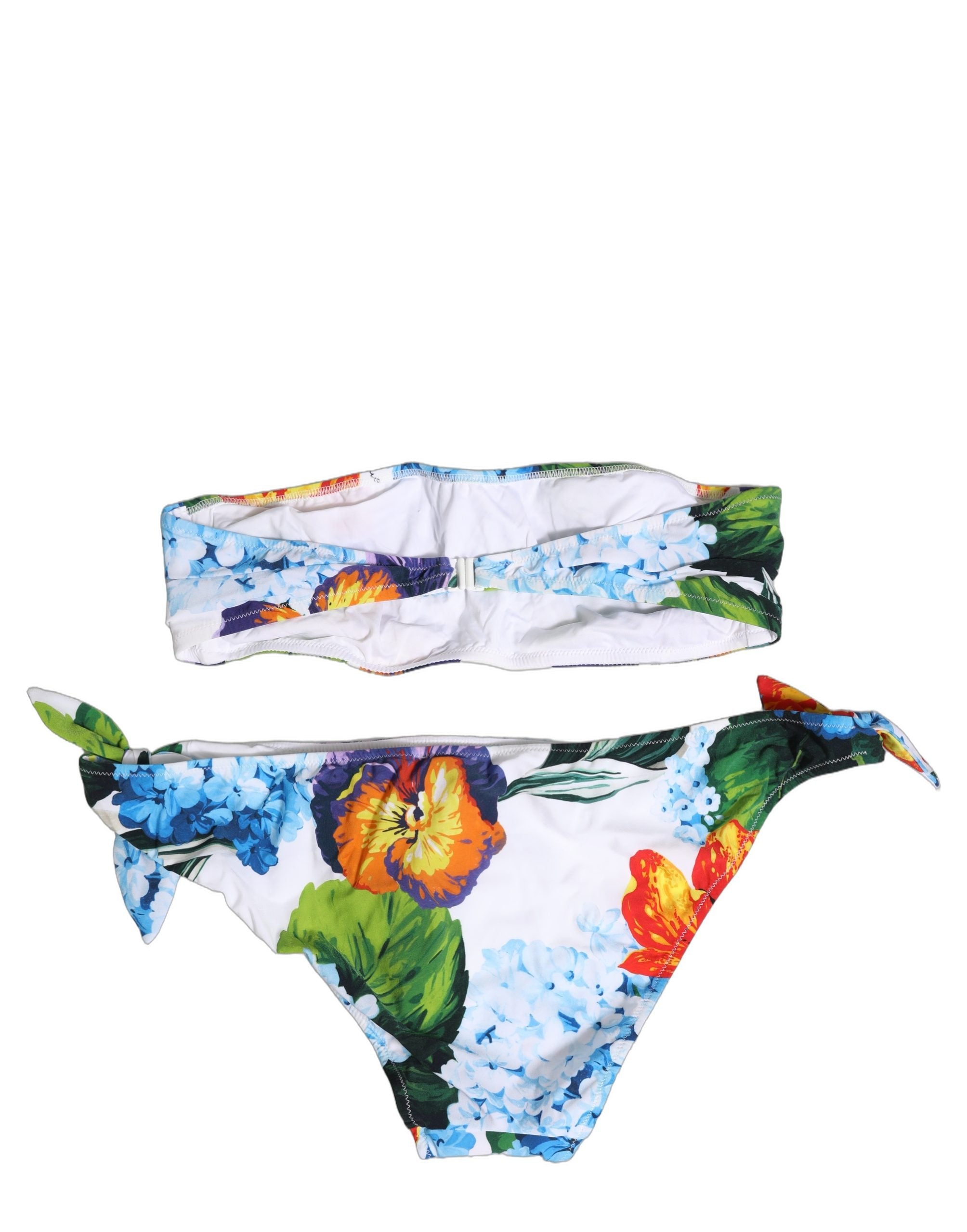 Maillot de bain deux pièces Dolce & Gabbana blanc à fleurs, haut bandeau et culotte assortie, idéale pour la plage.