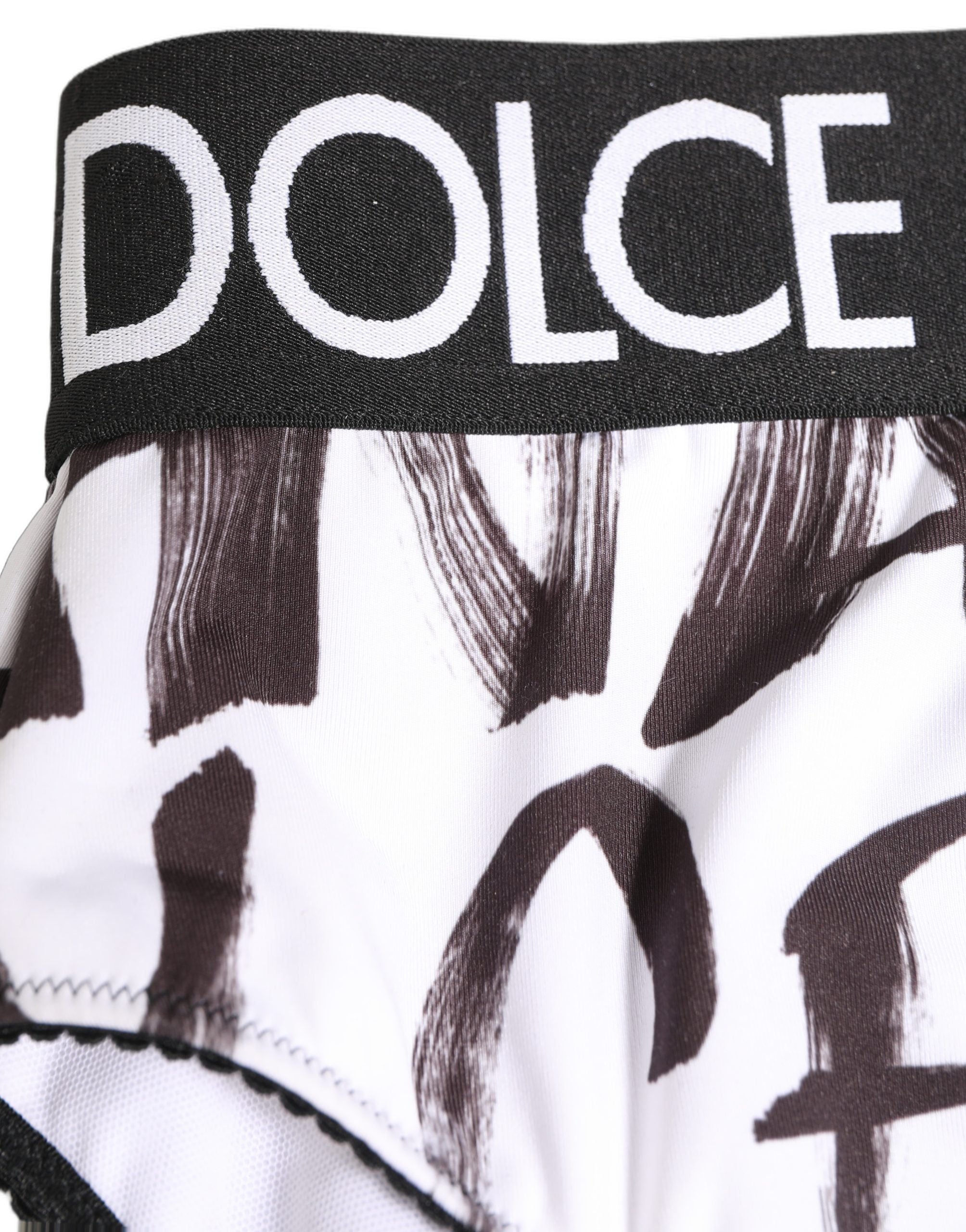 Sous-vêtements Dolce & Gabbana, culotte haute blanche et noire avec logo graphique, vue de face.