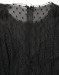 Robe courte sans manches Dolce & Gabbana en dentelle noire avec bordure en dentelle, coupe en A pour un style élégant.
