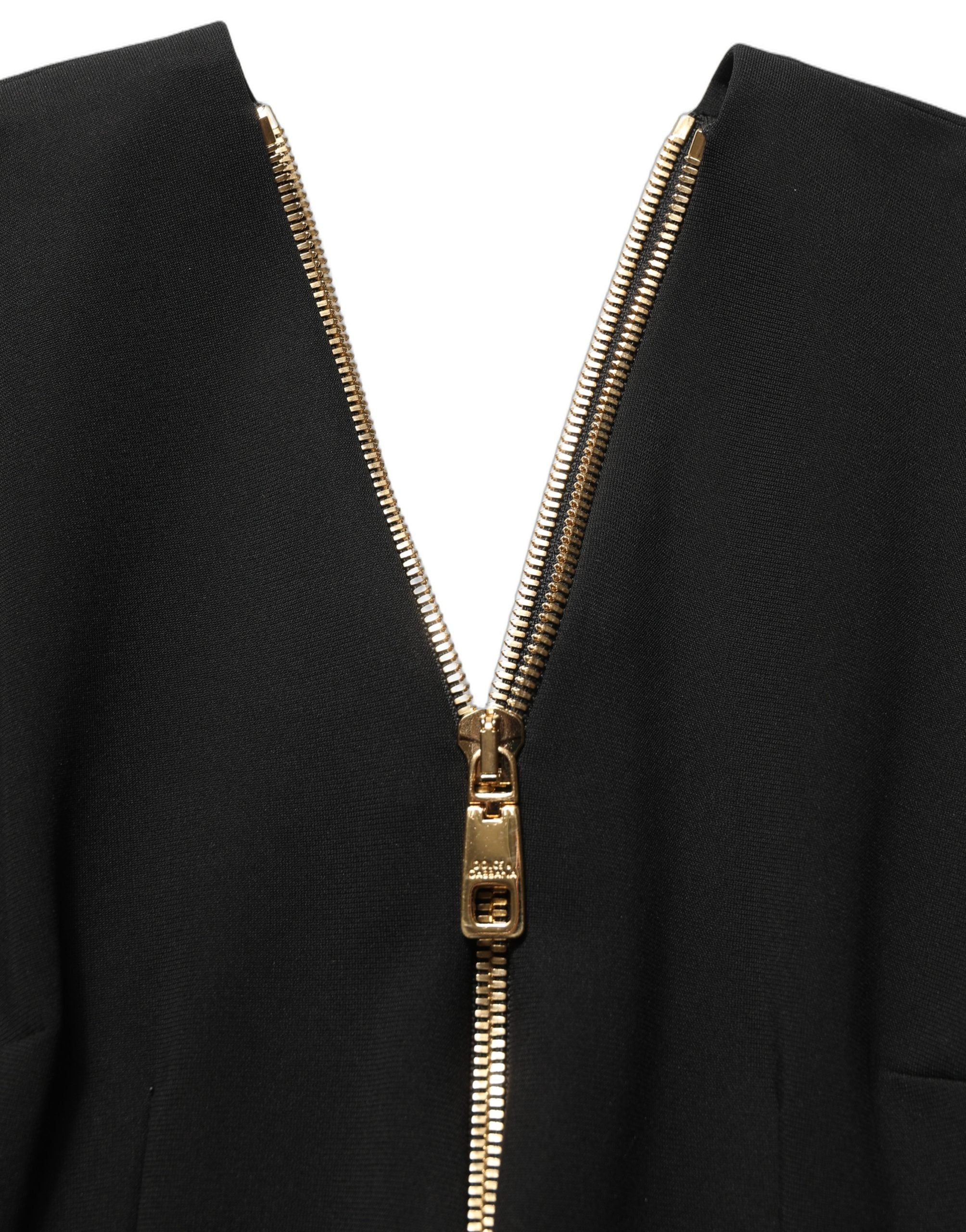Robe midi noire Dolce & Gabbana à manches longues avec zip frontal, élégante et ajustée.