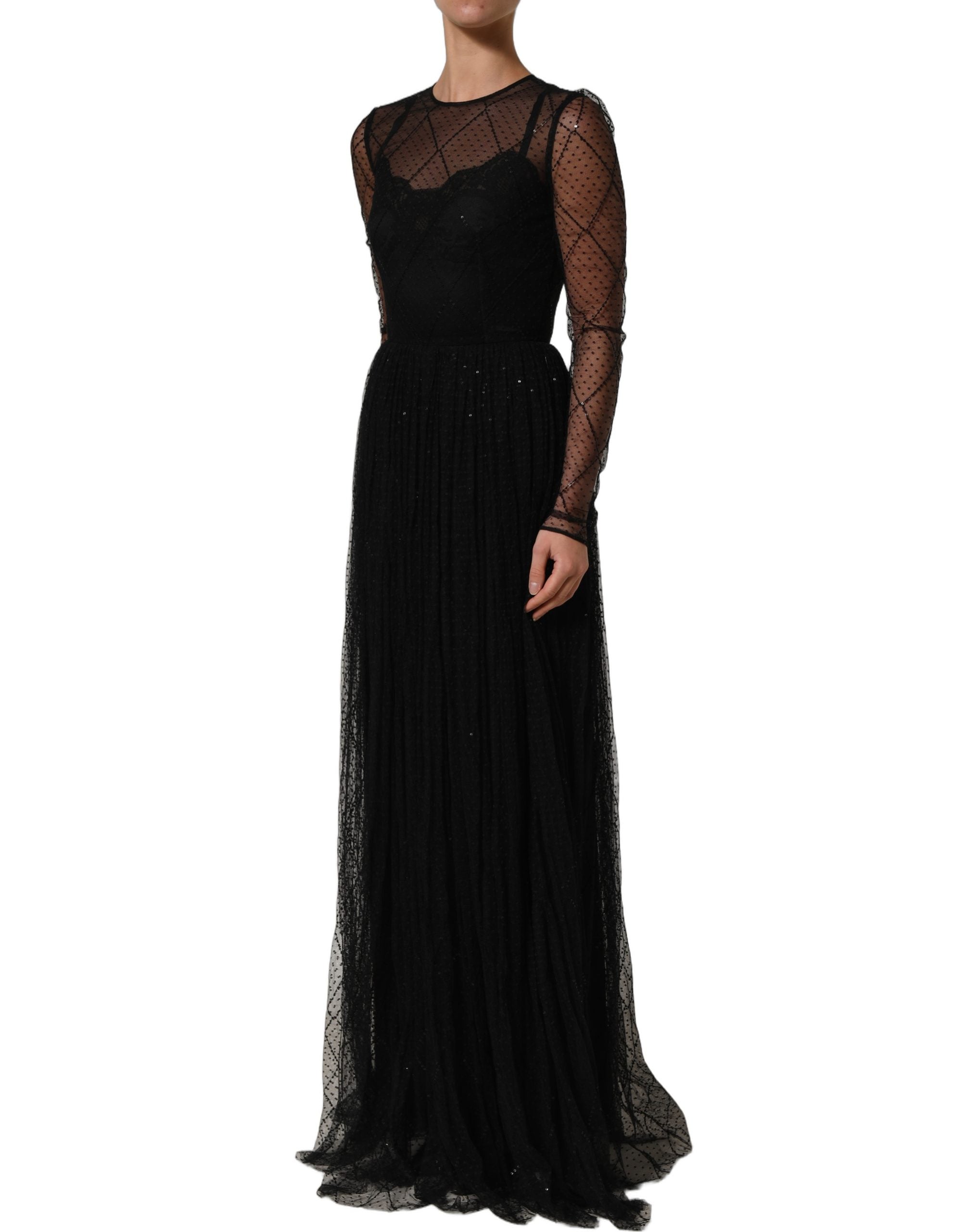 Robe longue en dentelle et mesh noir de Dolce & Gabbana avec manches longues et coupe élégante.