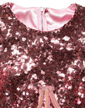 Robe longue Dolce & Gabbana rose avec corset à sequins et détails élégants, vêtement de soirée sophistiqué.