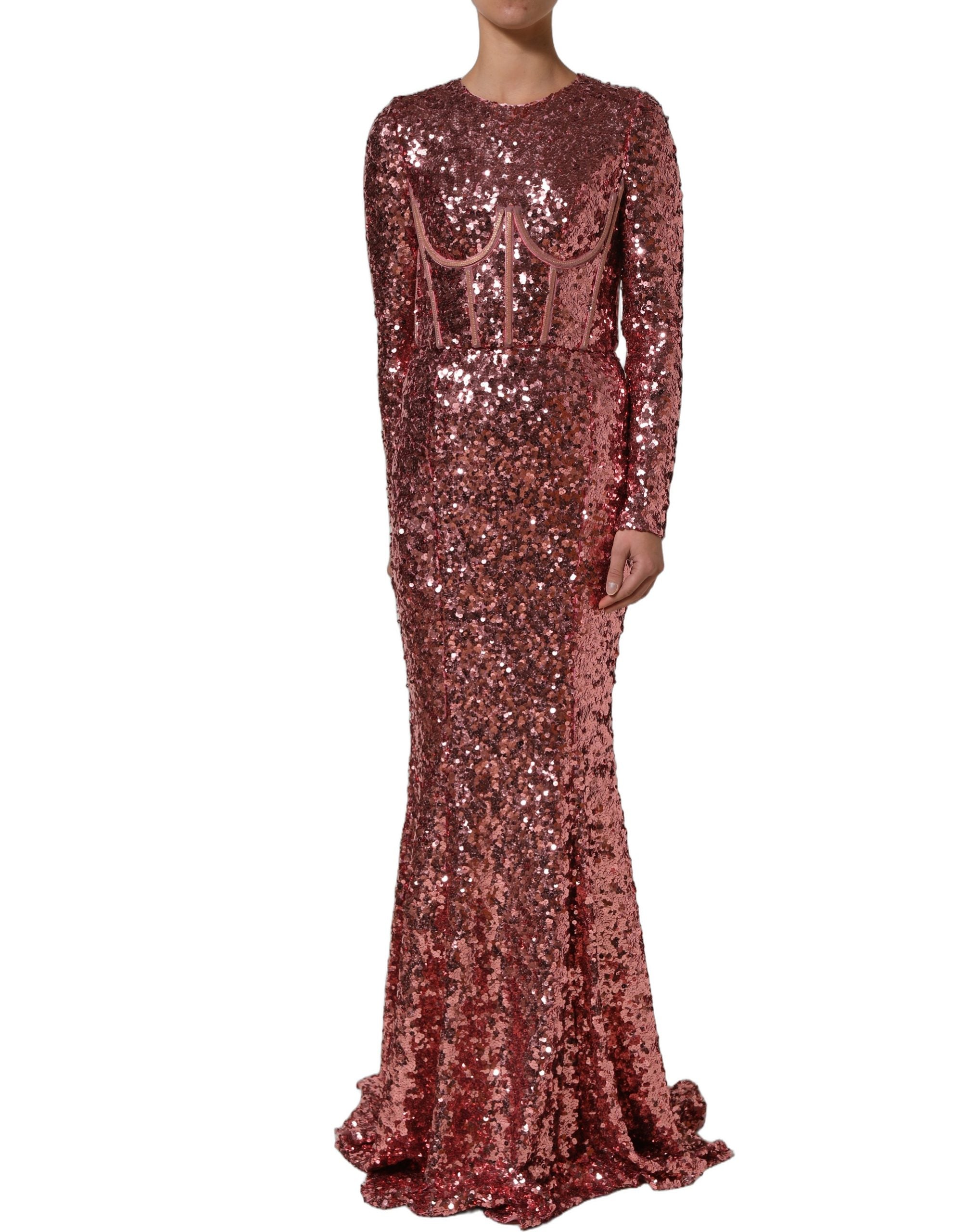Robe longue Dolce & Gabbana rose avec corset à sequins longs et détails élégants, vue de face sur un fond neutre.