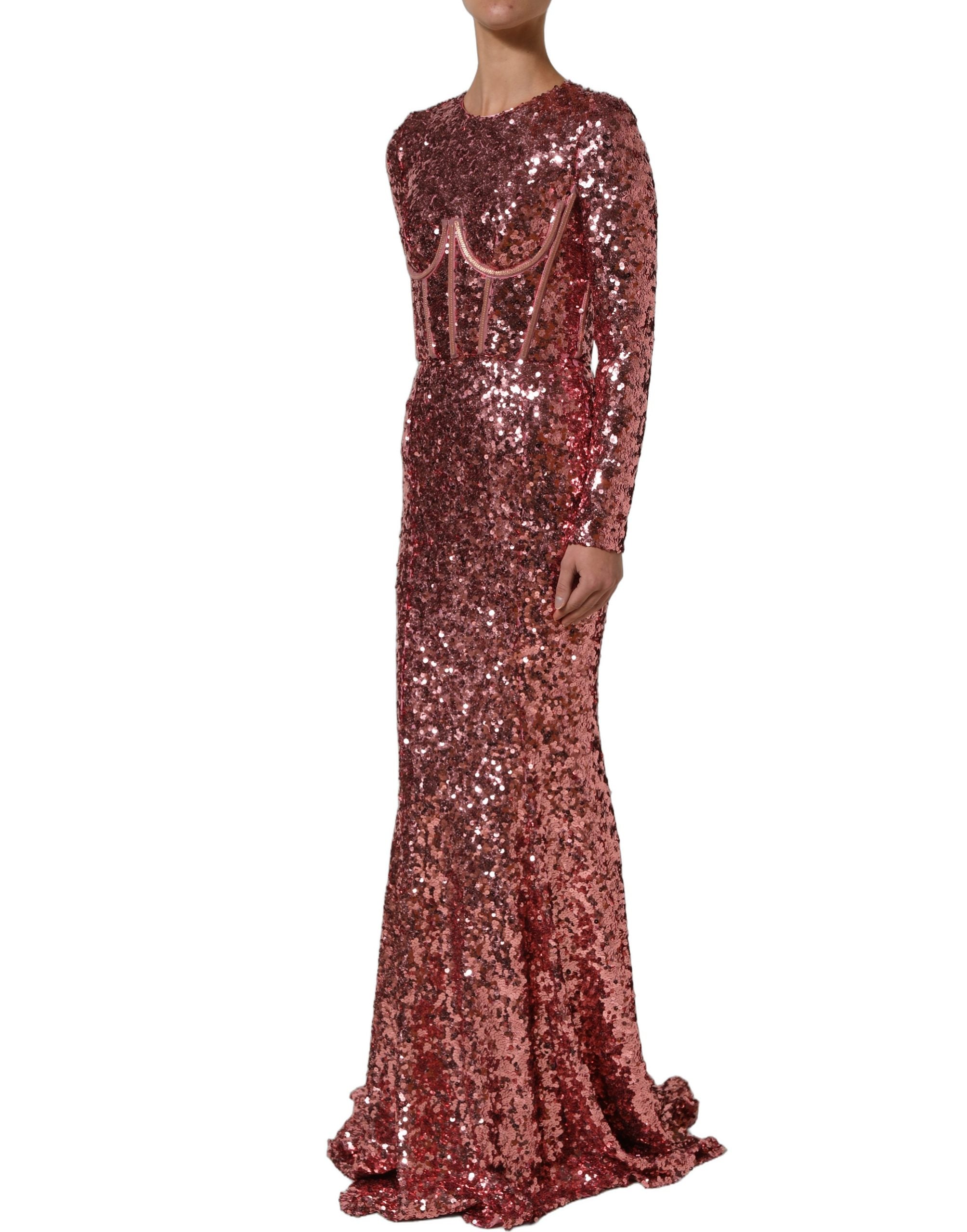 Robe longue Dolce & Gabbana rose avec corset en sequins, détails élégants, tissu fluide et finition sophistiquée.