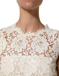 Robe midi sans manches en coton blanc avec dentelle à cordon, Dolce & Gabbana, élégante et raffinée.