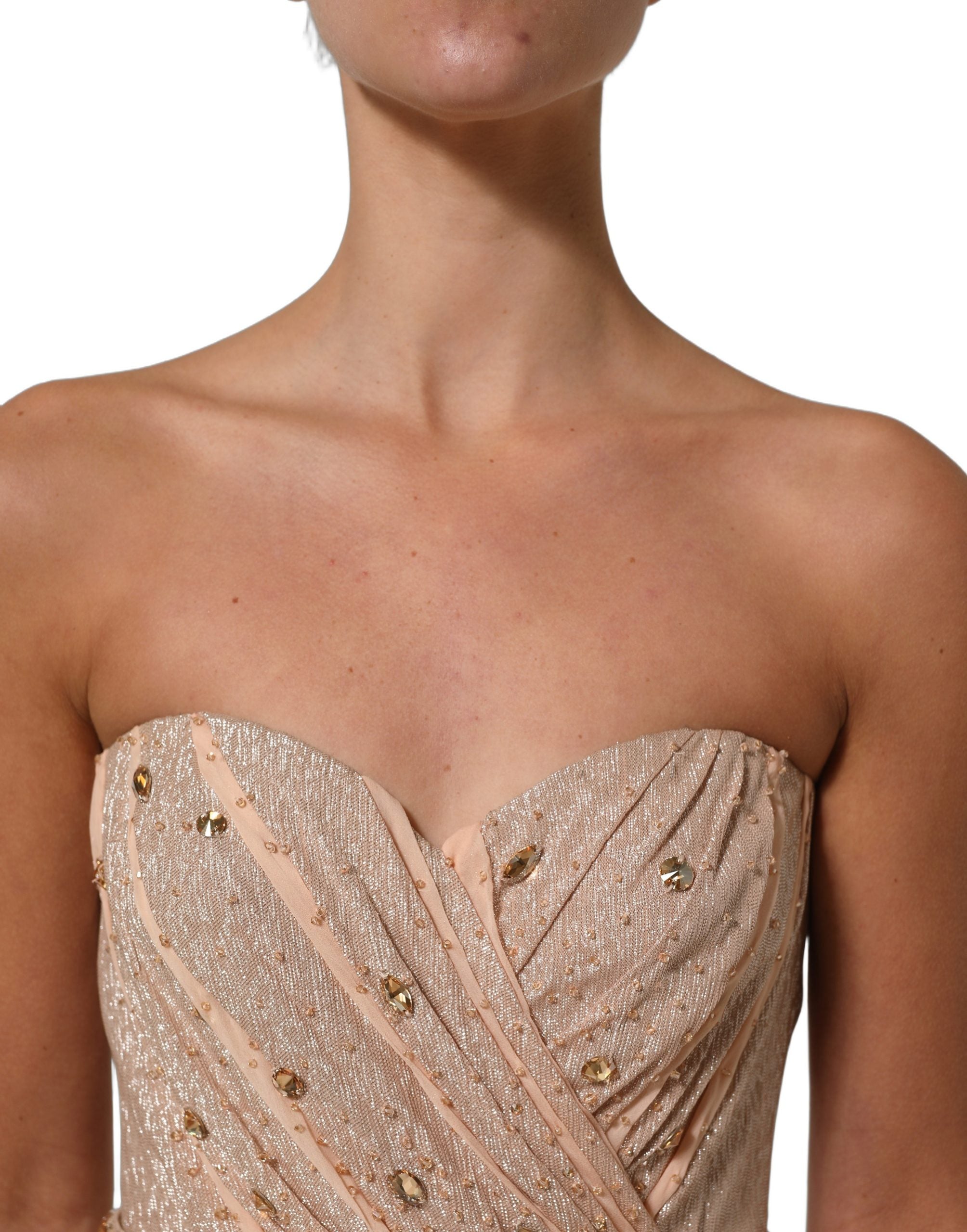 Robe de soirée bustier nude Dolce & Gabbana ornée de détails scintillants, élégante et sophistiquée.