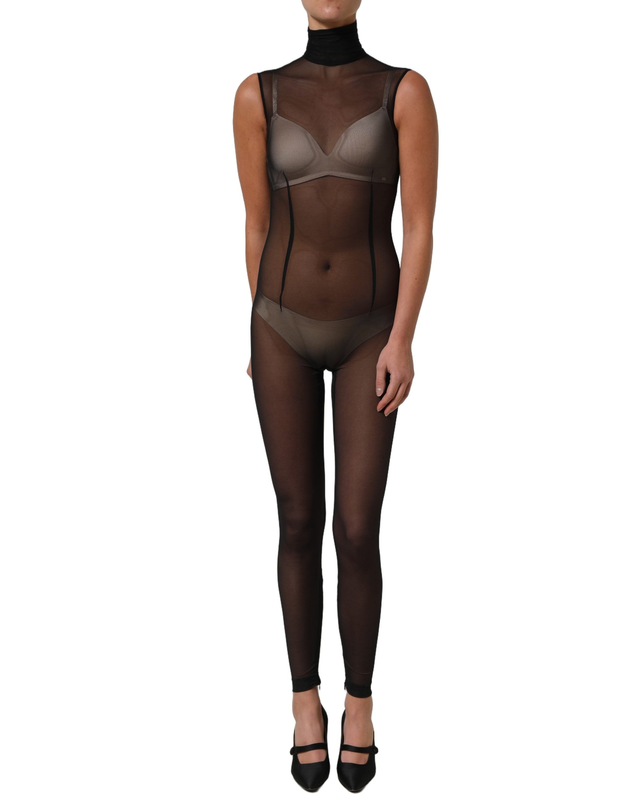 Combinaison noire en mesh transparent Dolce & Gabbana avec col roulé, élégante et ajustée, portée comme une robe sophistiquée.
