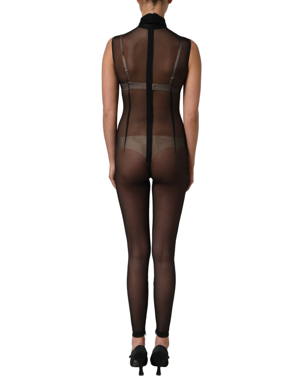 Combinaison en résille noire Dolce & Gabbana avec col roulé en tissu transparent, élégante et ajustée.