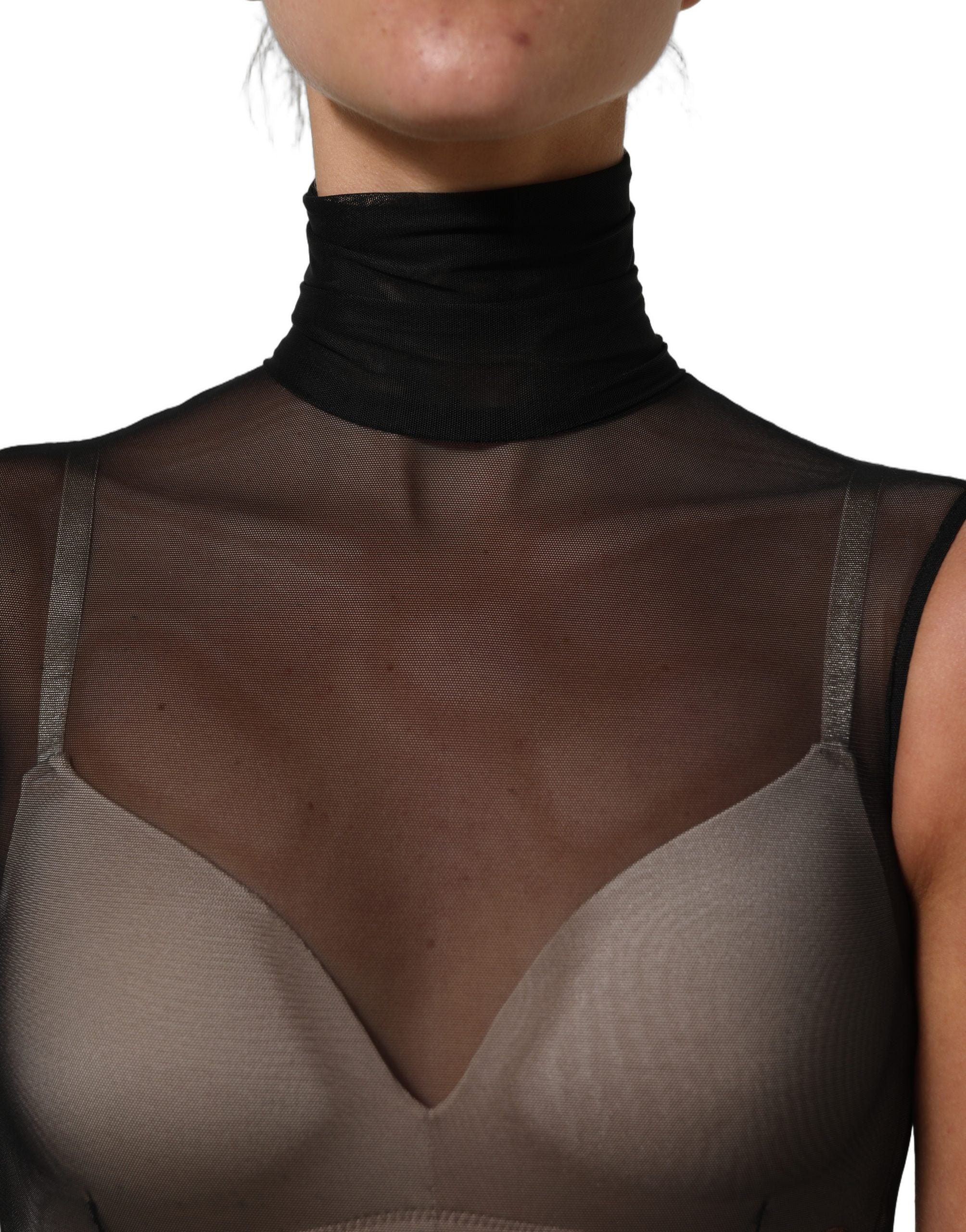 Combinaison noire en maille transparente Dolce & Gabbana avec col roulé, vêtement élégant et ajusté, vue de face.