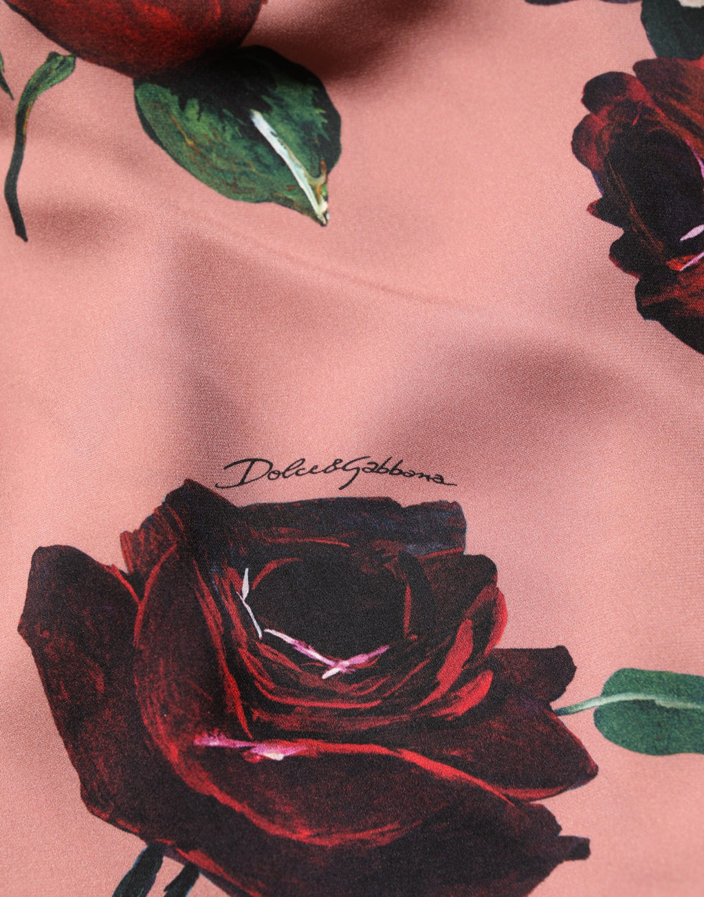 Robe longue bustier en soie rose poussière avec motifs floraux de Dolce & Gabbana, élégante et féminine.