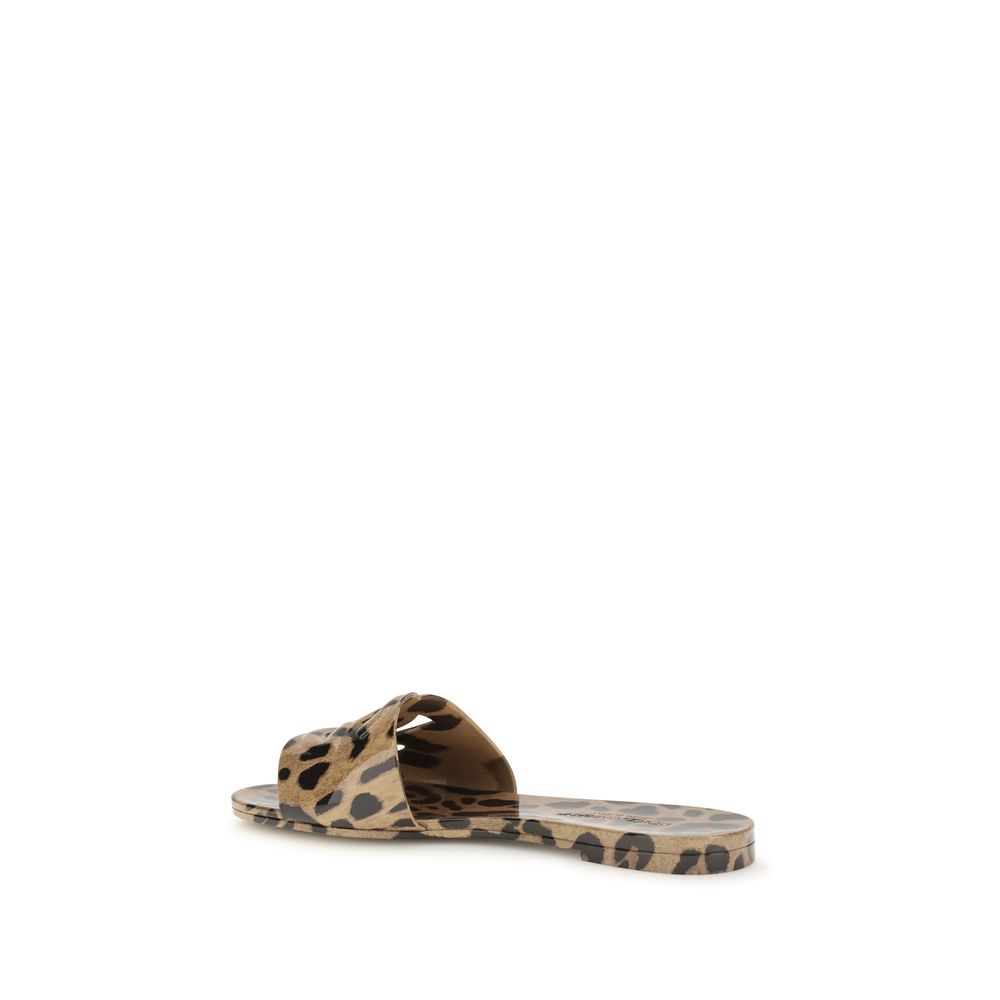 Sandales plates en caoutchouc multicolores Dolce & Gabbana avec semelle plate et design coloré, pour un style estival.