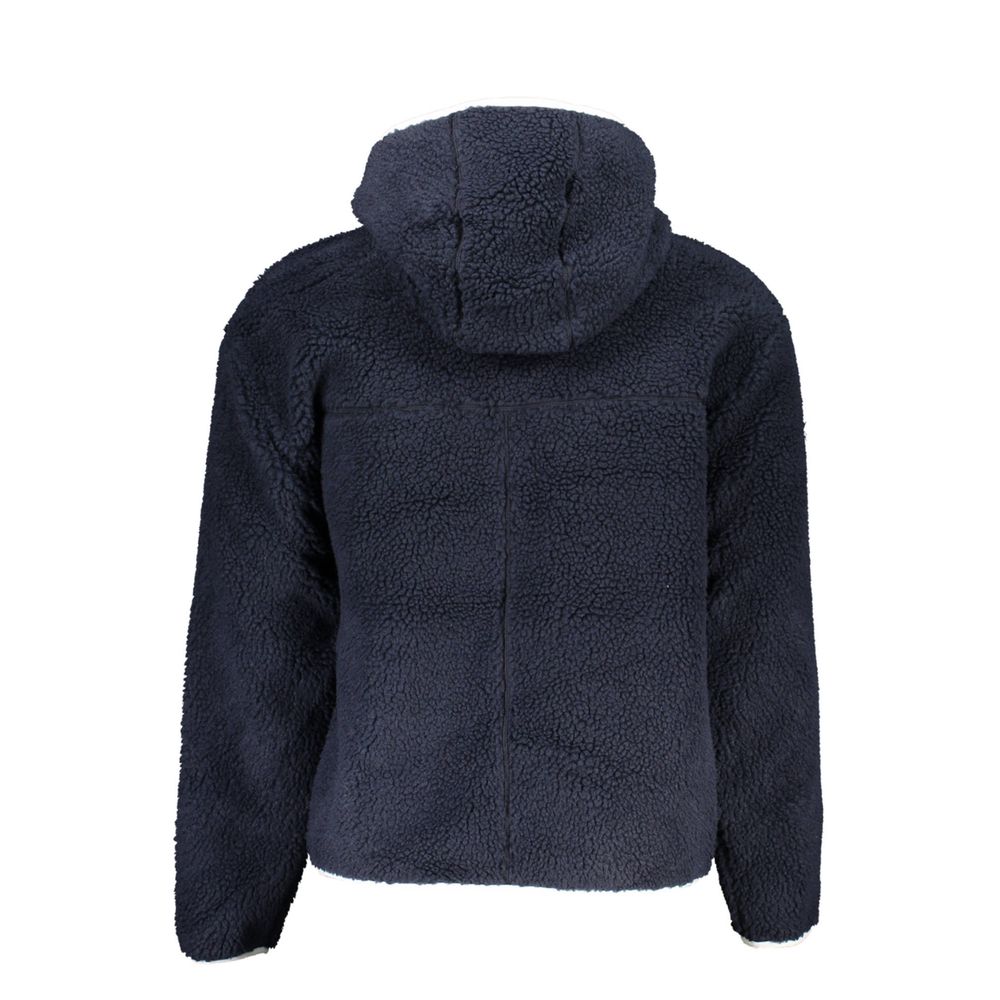 Veste pour homme Tommy Hilfiger en polyester bleu, coupe classique et détails modernes pour un style décontracté.