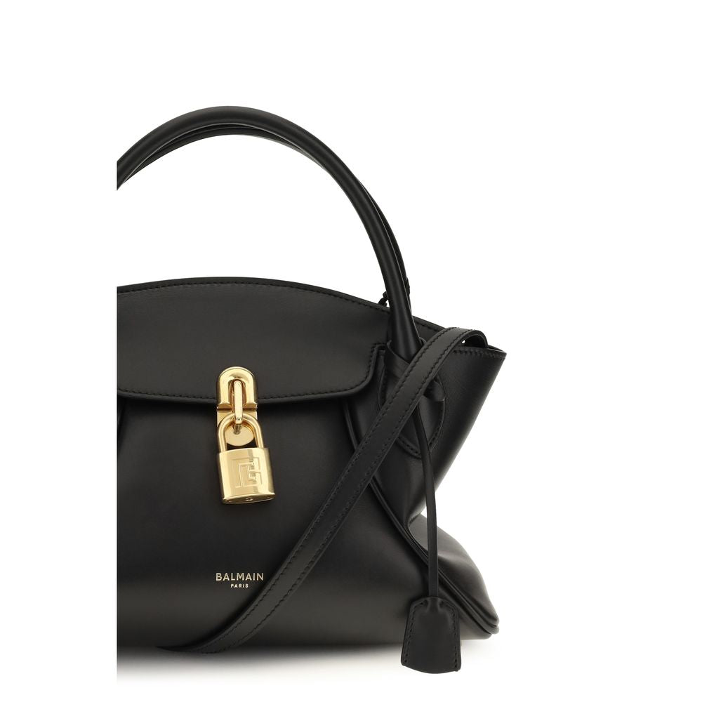 Sac à main Balmain en cuir de veau noir Bos Taurus, finition élégante et détails sophistiqués.