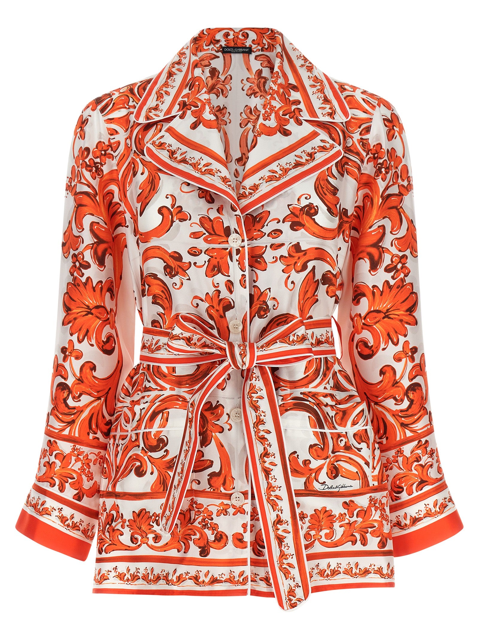 Blouse en soie orange Dolce & Gabbana, élégante et fluide, avec des détails raffinés visibles sur l'image.