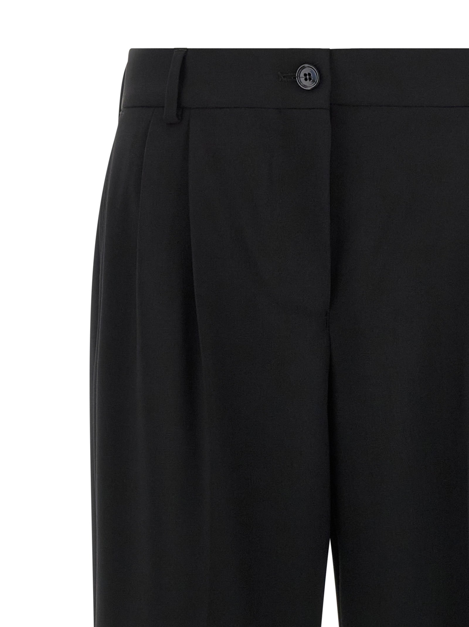 Pantalon décontracté en laine vierge noire de Dolce & Gabbana, coupe classique pour homme ou femme.