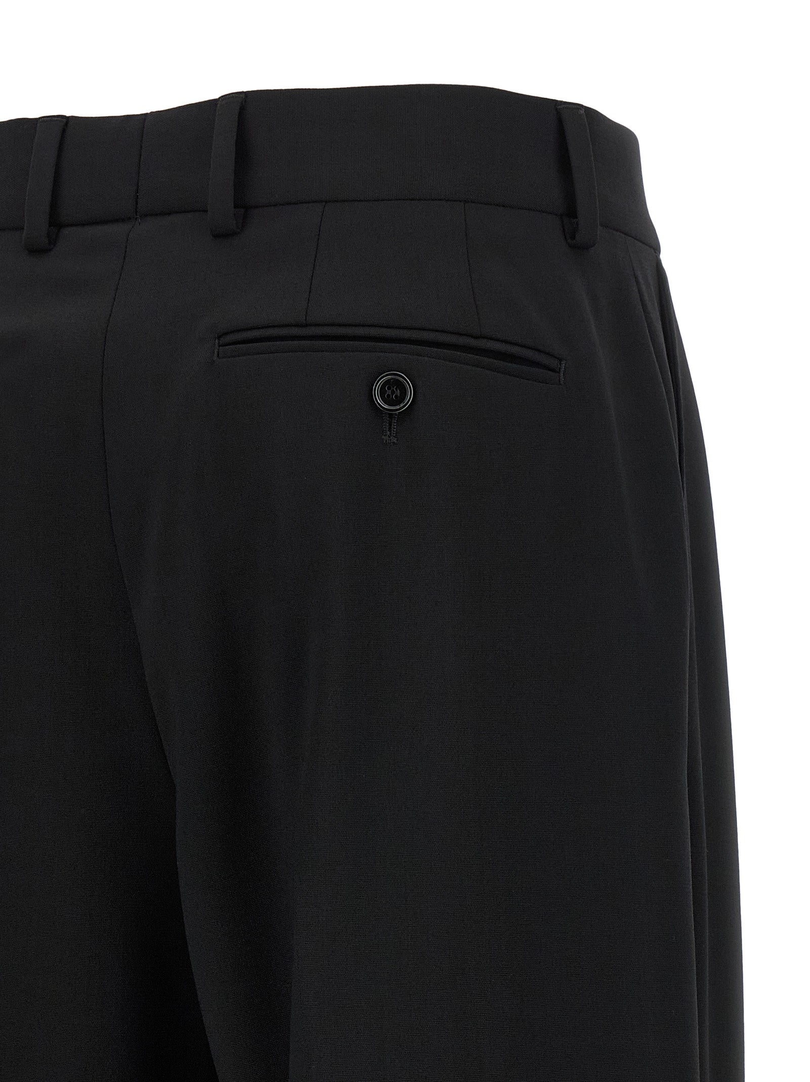 Pantalon décontracté en laine vierge noire de Dolce & Gabbana, coupe élégante et style casual pour homme.