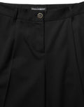 Pantalon noir Dolce & Gabbana à taille haute, coupe droite, élégant et tendance, en tissu fluide pour femme.