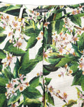 Pantalons droits courts blancs à imprimé floral Dolce & Gabbana, vue de face, en tissu léger.