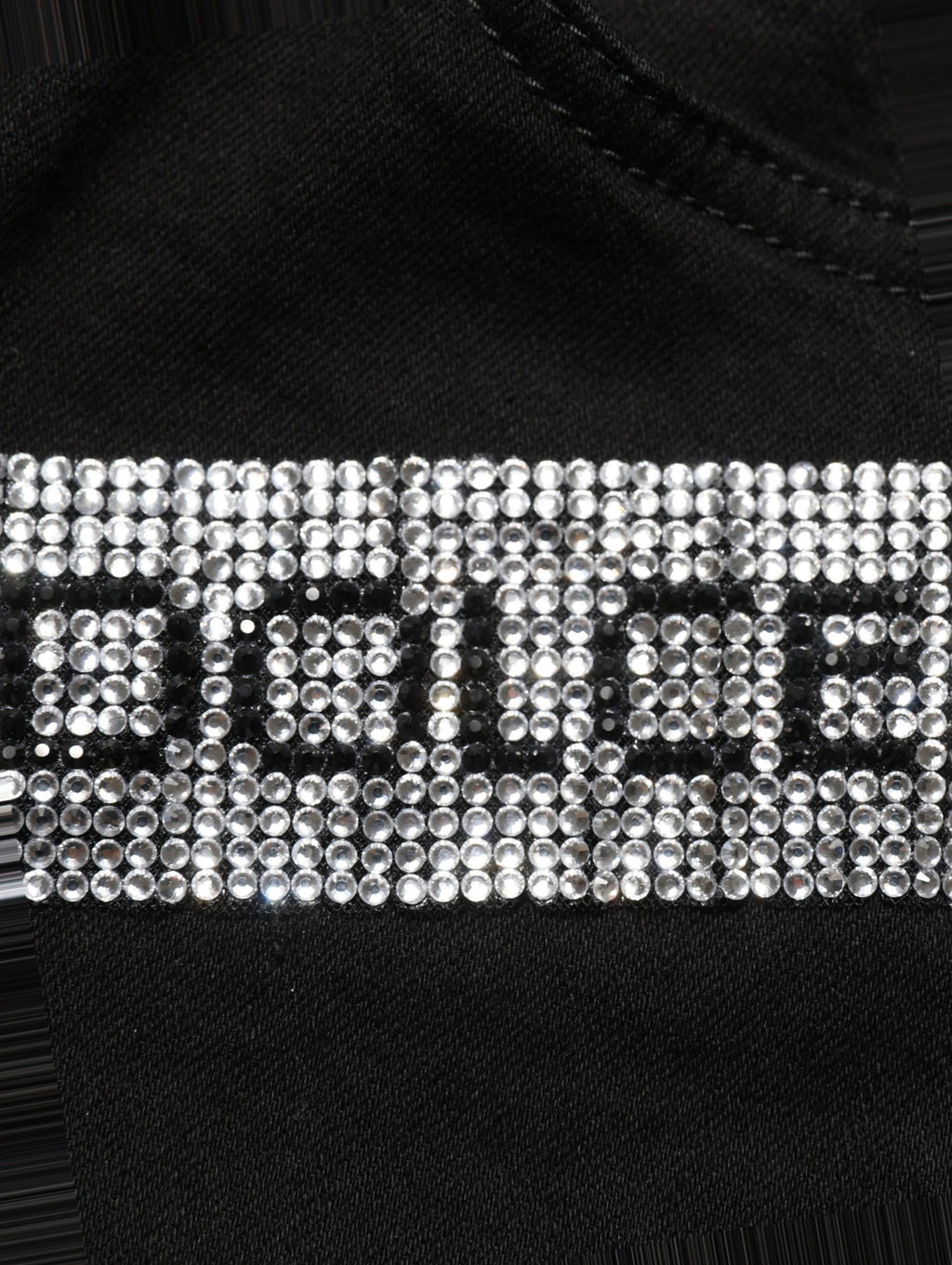 Jeans en denim noir Dolce & Gabbana Grace à taille haute ornés de strass avec style élégant et détails raffinés.