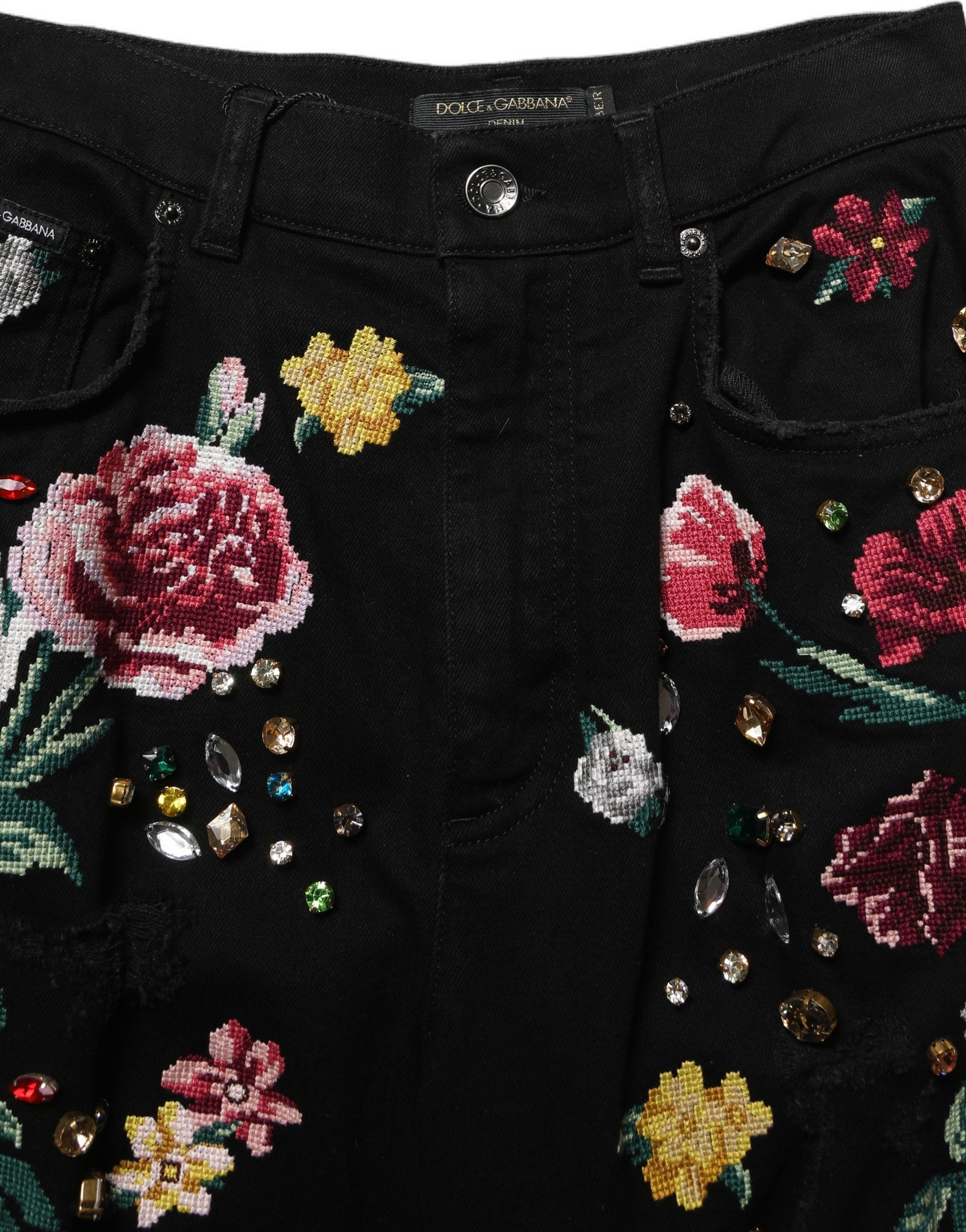 Pantalon en coton noir à fleurs Dolce & Gabbana, taille haute, coupe tapered, mode élégante et confortable.