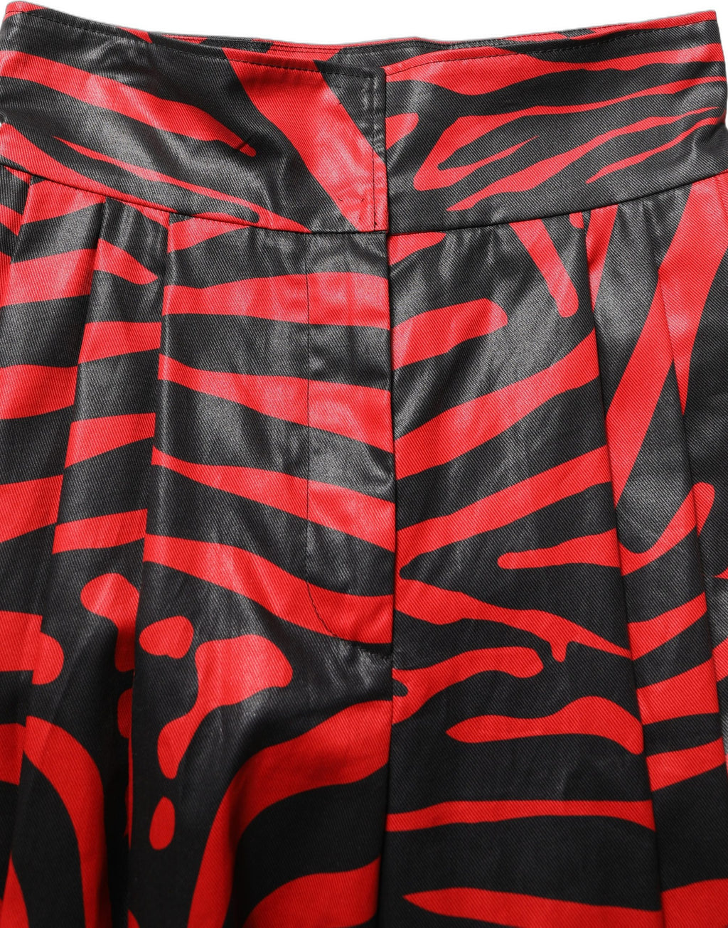 Pantalon en coton à taille haute Dolce & Gabbana avec motif zèbre rouge et noir, style élégant et moderne.