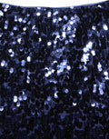 Jupe midi Dolce & Gabbana en sequins bleus, taille haute, coupe pencil, élégante et sophistiquée.