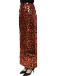 Jupe mi-longue en sequins bronze à taille haute de Dolce & Gabbana, coupe pencil, élégante et brillante.