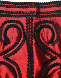 Jupe courte rouge Dolce & Gabbana avec broderie soutache en forme trapèze, élégante et élégante.