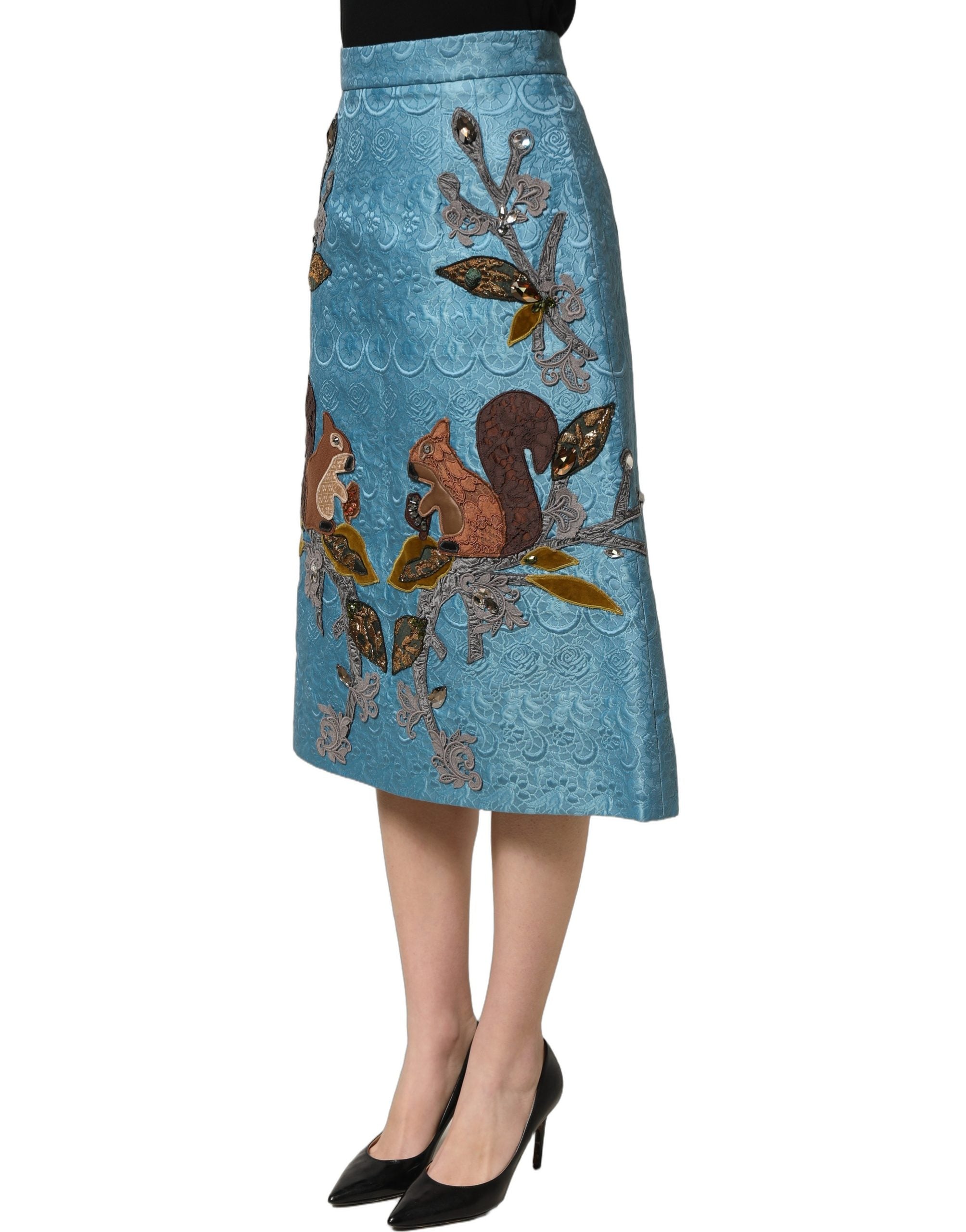 Jupe midi en jacquard bleu brodé de Dolce & Gabbana, coupe en ligne A élégante et sophistiquée.