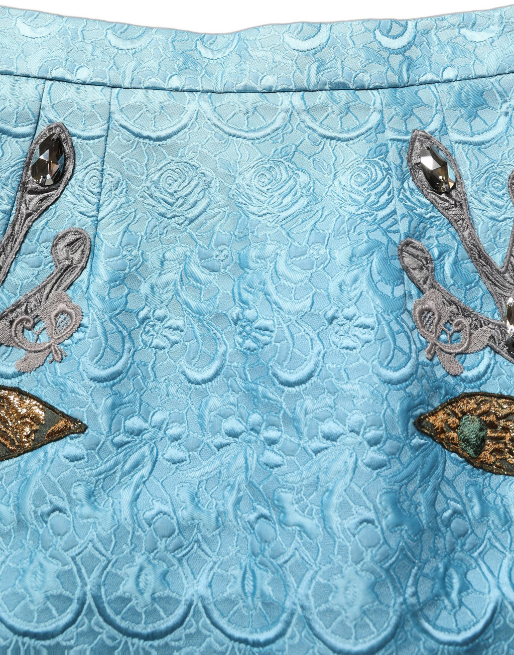Jupon midi en jacquard bleu avec broderies, marque Dolce & Gabbana, coupe A-line, tissu élégant et sophistiqué.