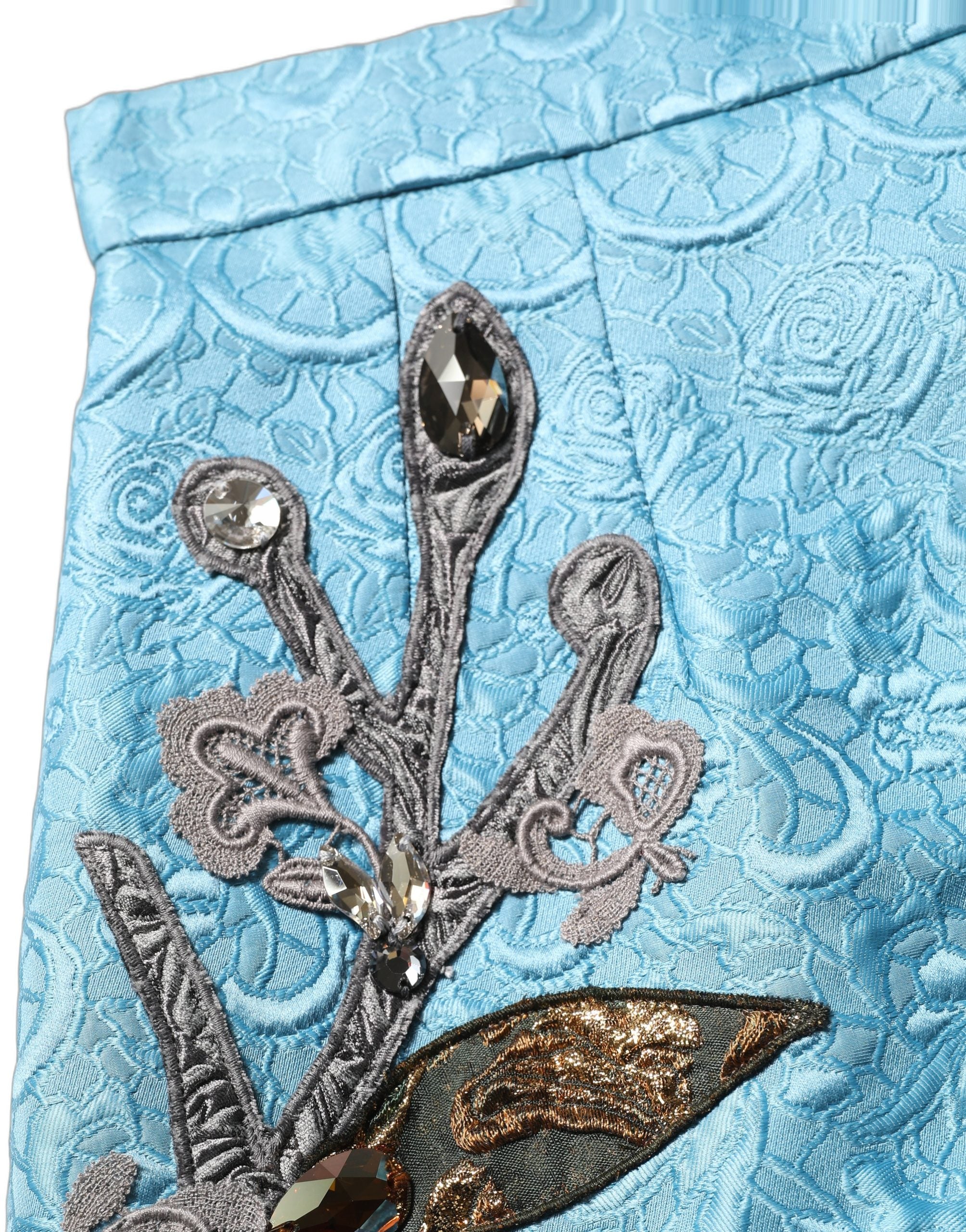 Jupe midi évasée Dolce & Gabbana en jacquard bleu brodé, style A-line, élégante et sophistiquée.