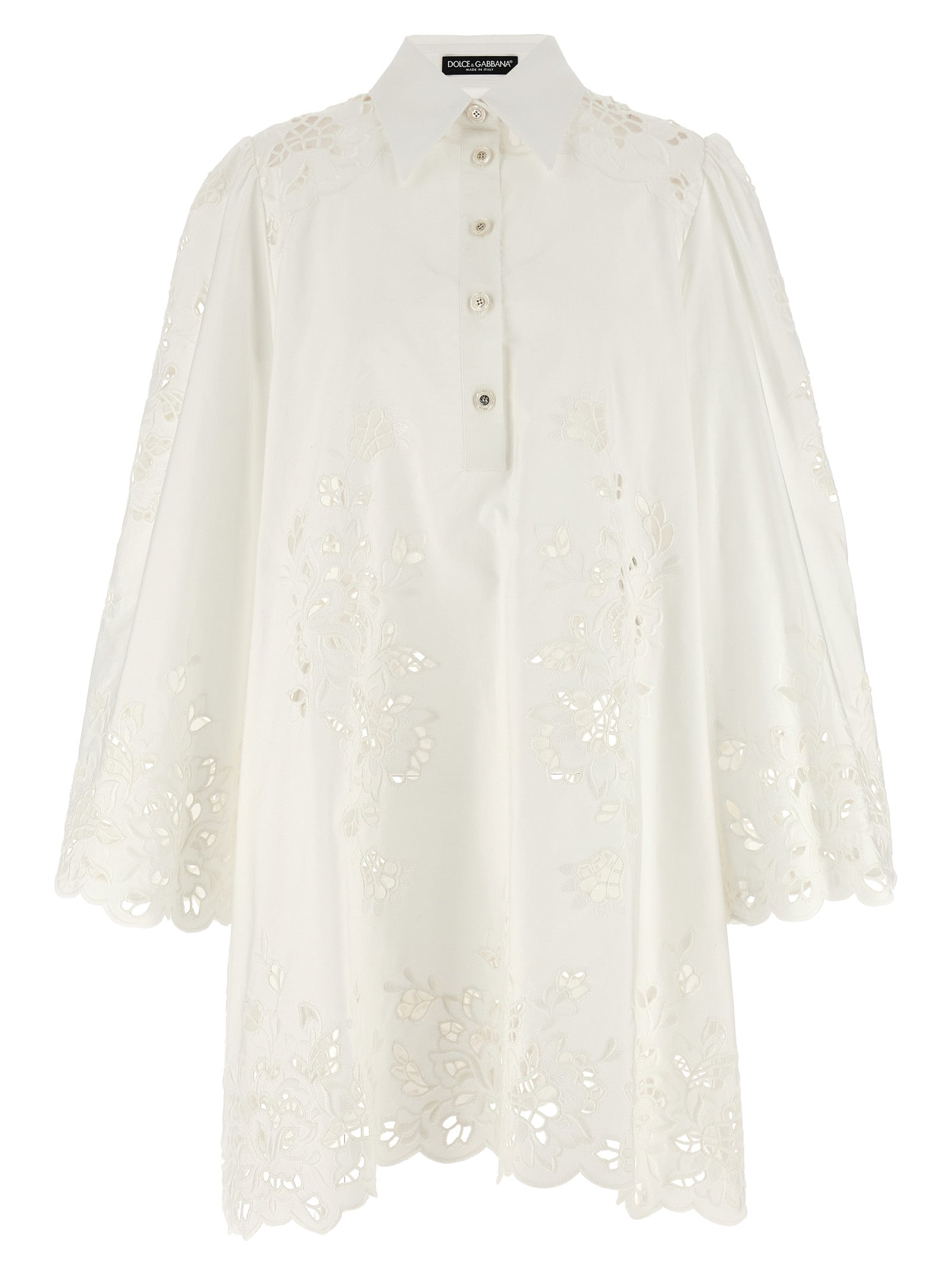 Robe courte en coton blanc de Dolce & Gabbana, silhouette élégante avec détails sophistiqués, portée décontractée ou habillée.
